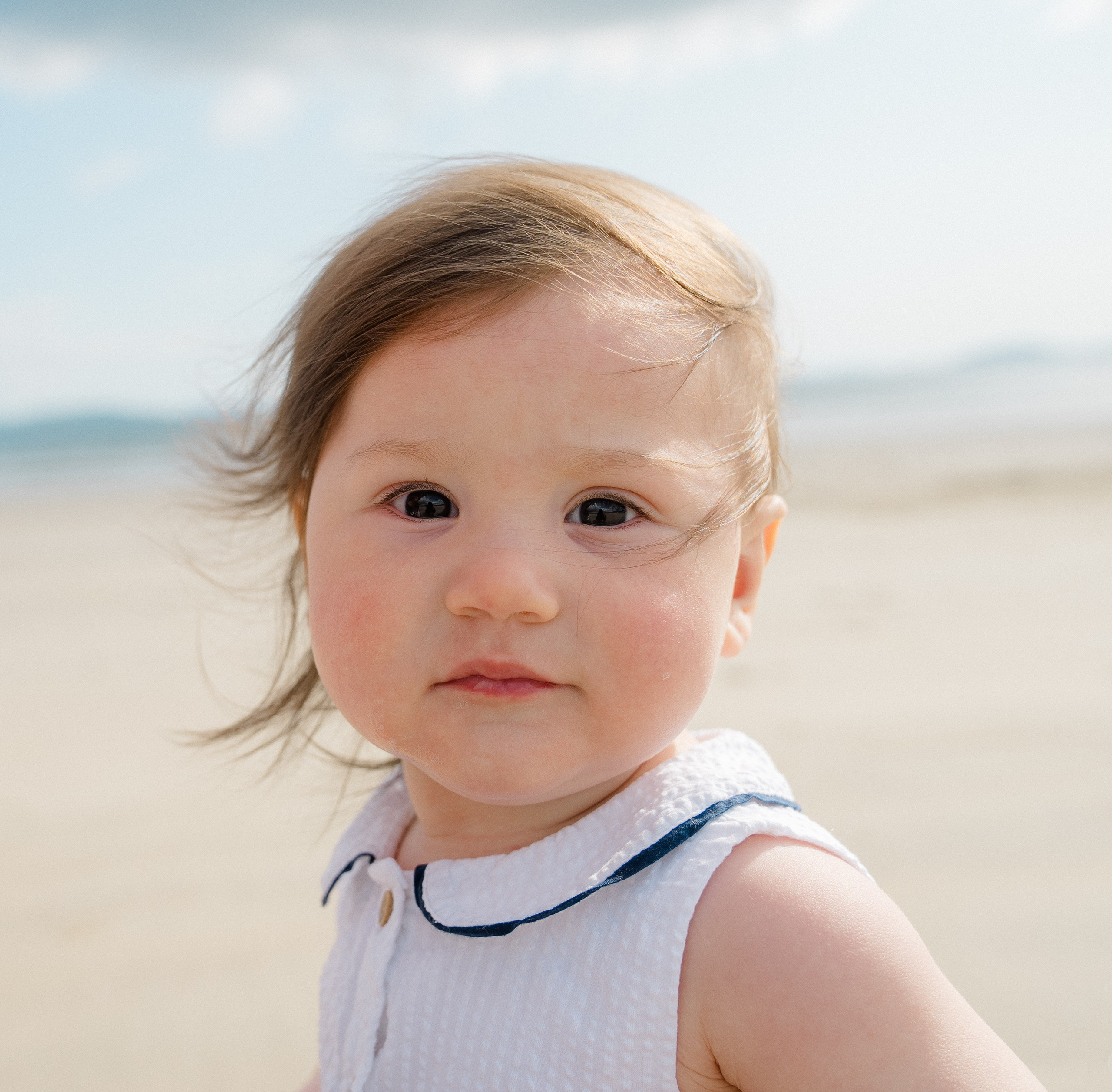 Darya and Mia at the ocean. Wedding and family photographer Ireland