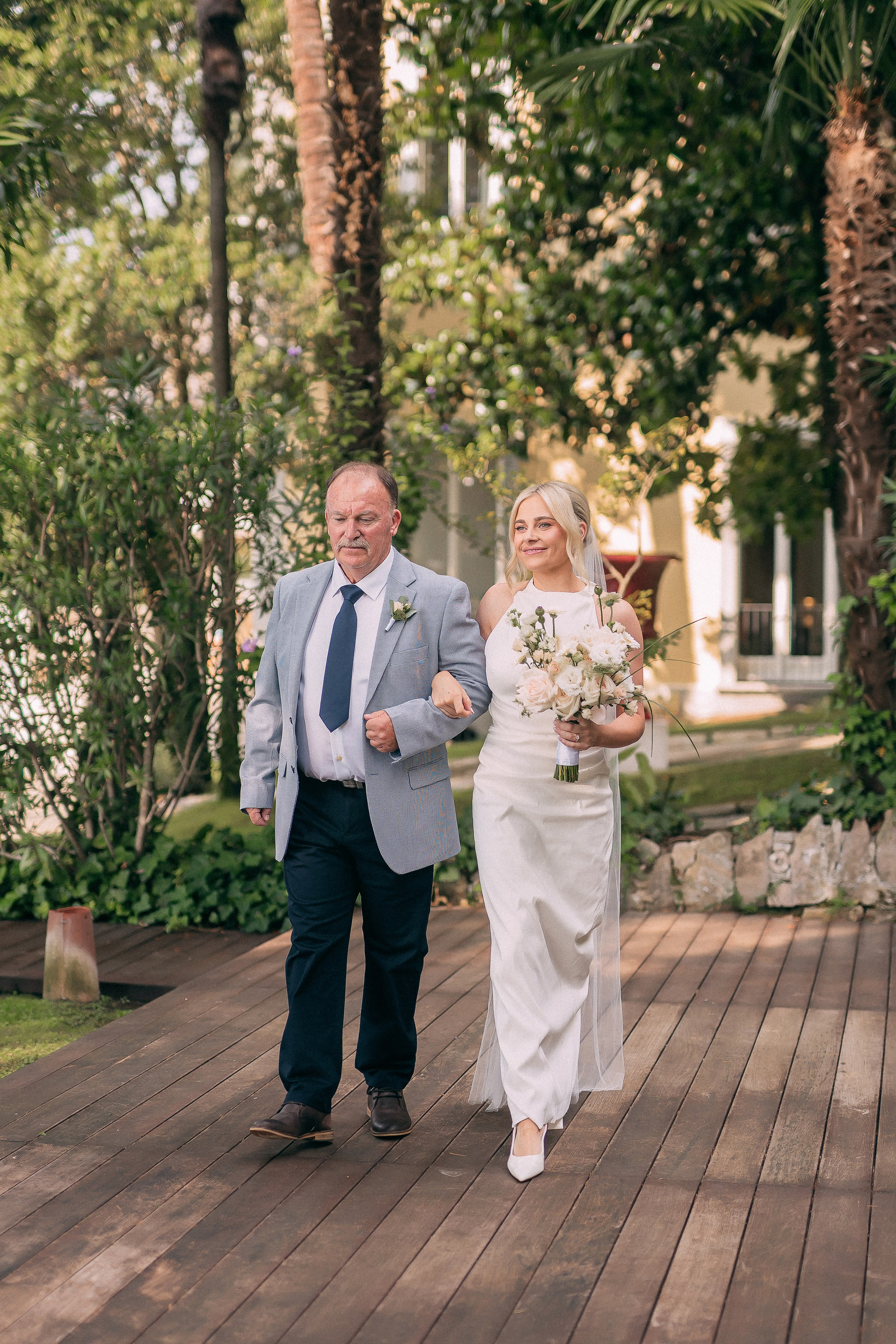 Bride and groom meeting for their first look at Villa Lario, Lake Como, Italy