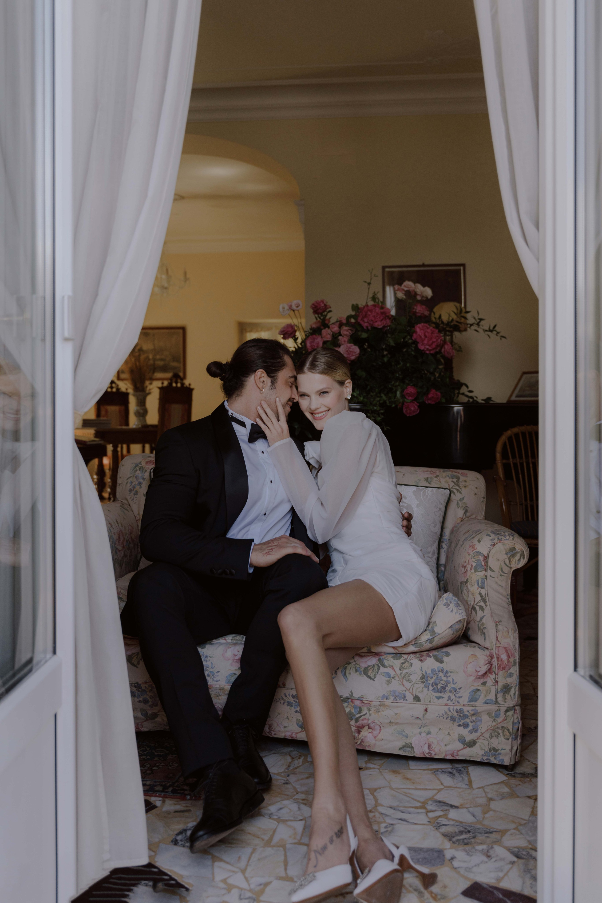     couple embracing Lake Como elopement editorial style