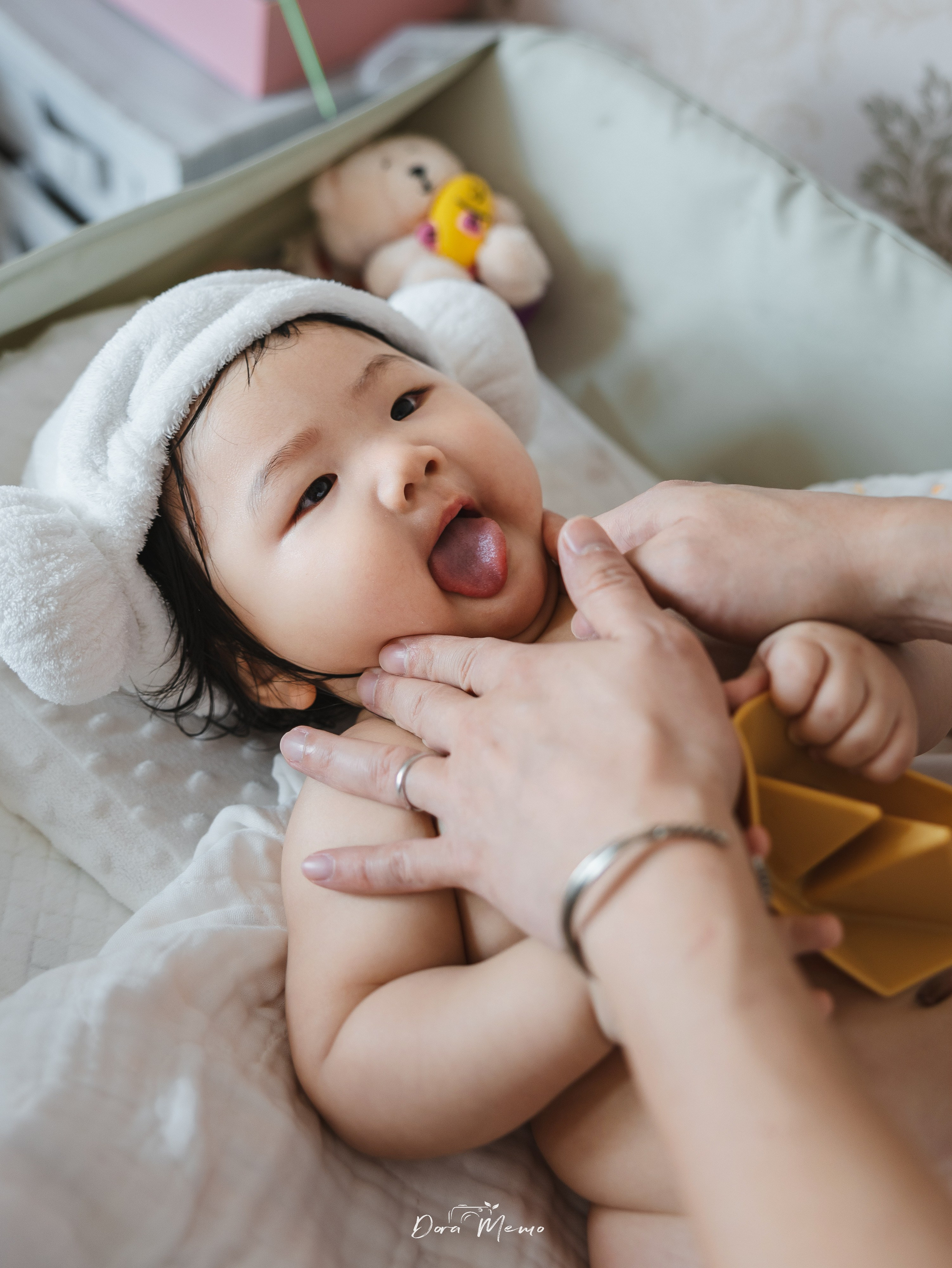 Dad gave his 8-month-old baby a gentle massage.