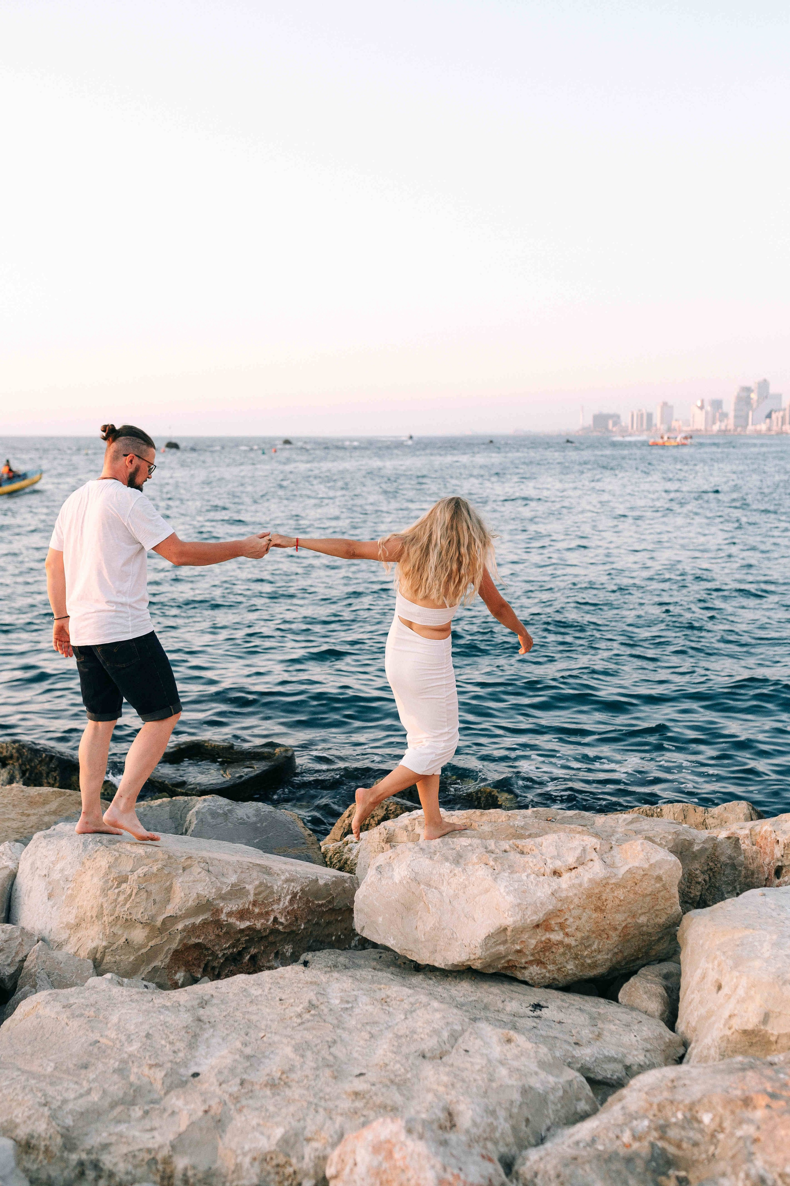 SUNSET IN JAFFO PORT. PHOTOGRAPHER IN ISRAEL