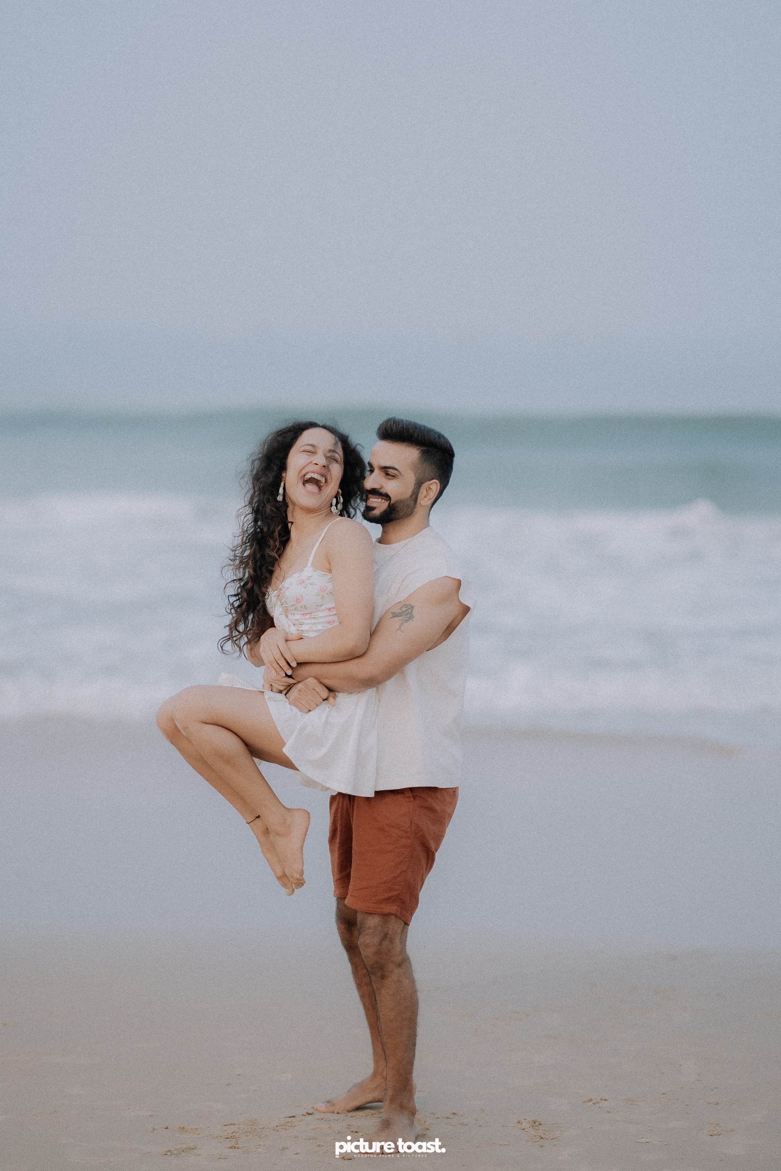 Love In The Beach. Fine art Wedding Photographers in India & Canada