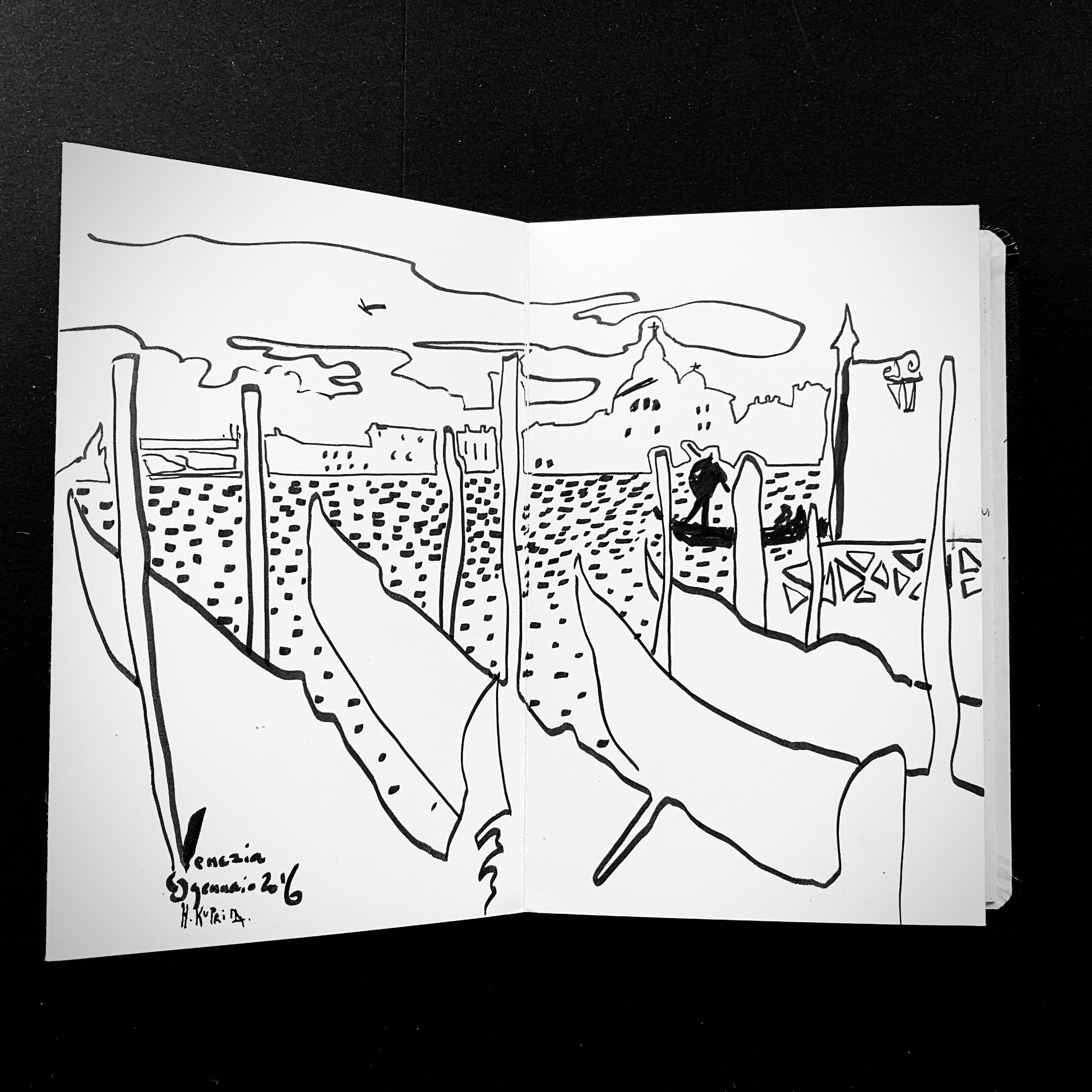 Moleskine notebook with original drawings made in Venice, research on paper for an editorial project by an artist who lives and works in Venice. A strong black and white illustration of gondolas in a line.