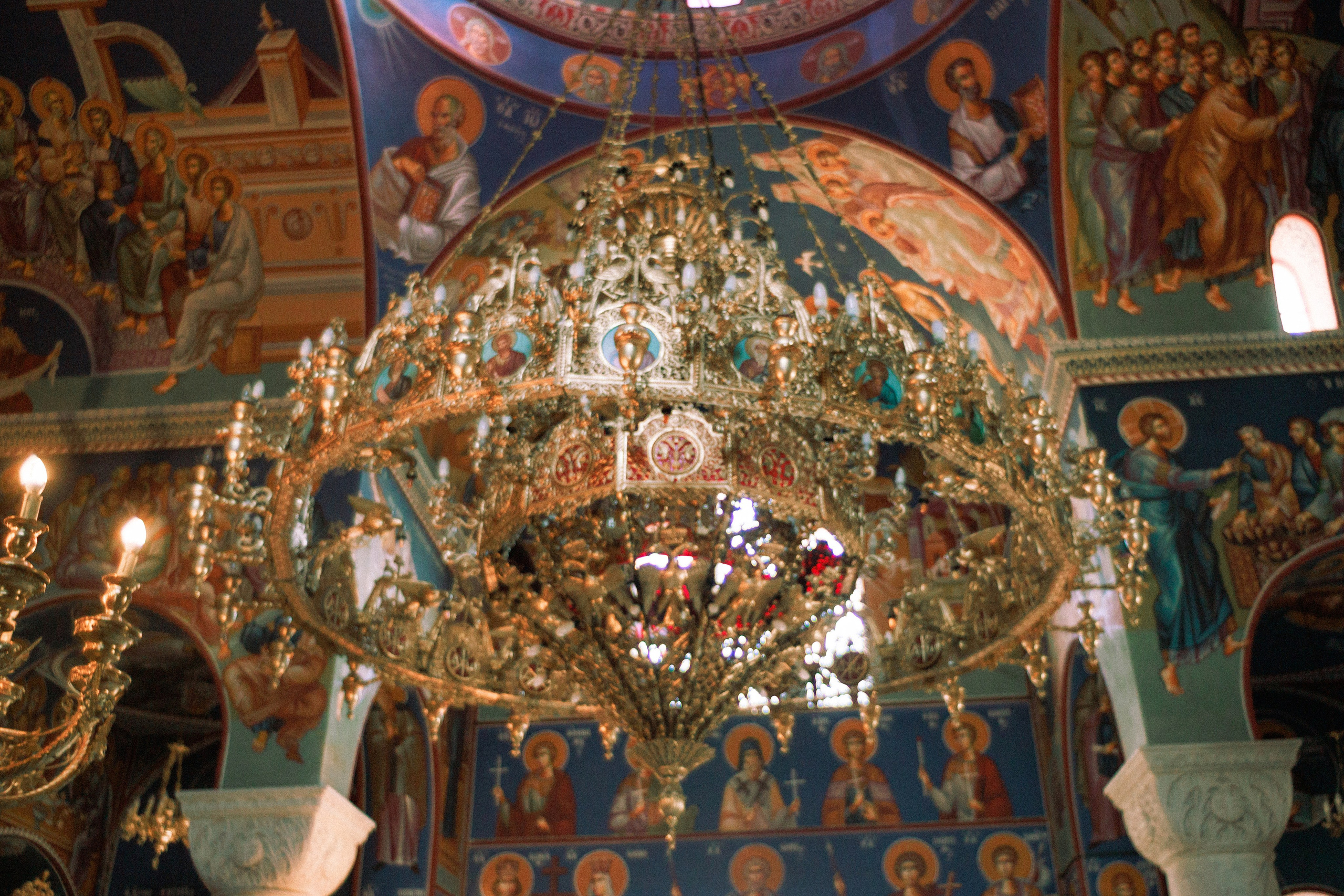 Christening of young Manolis. Photographer in Greece Kristina