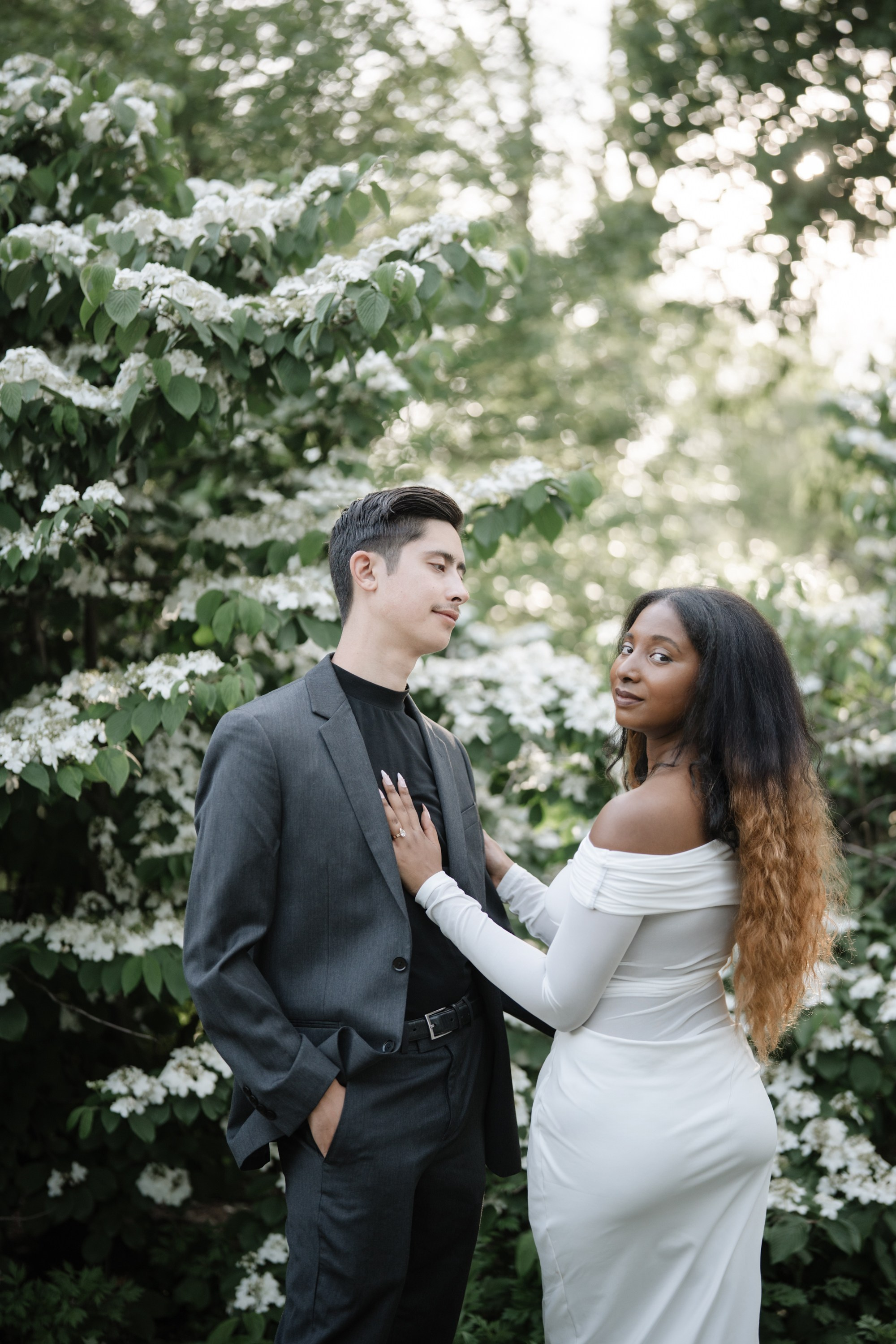 Engagement photo shoot in Central Park in spring. Portrait and wedding photographer in New York