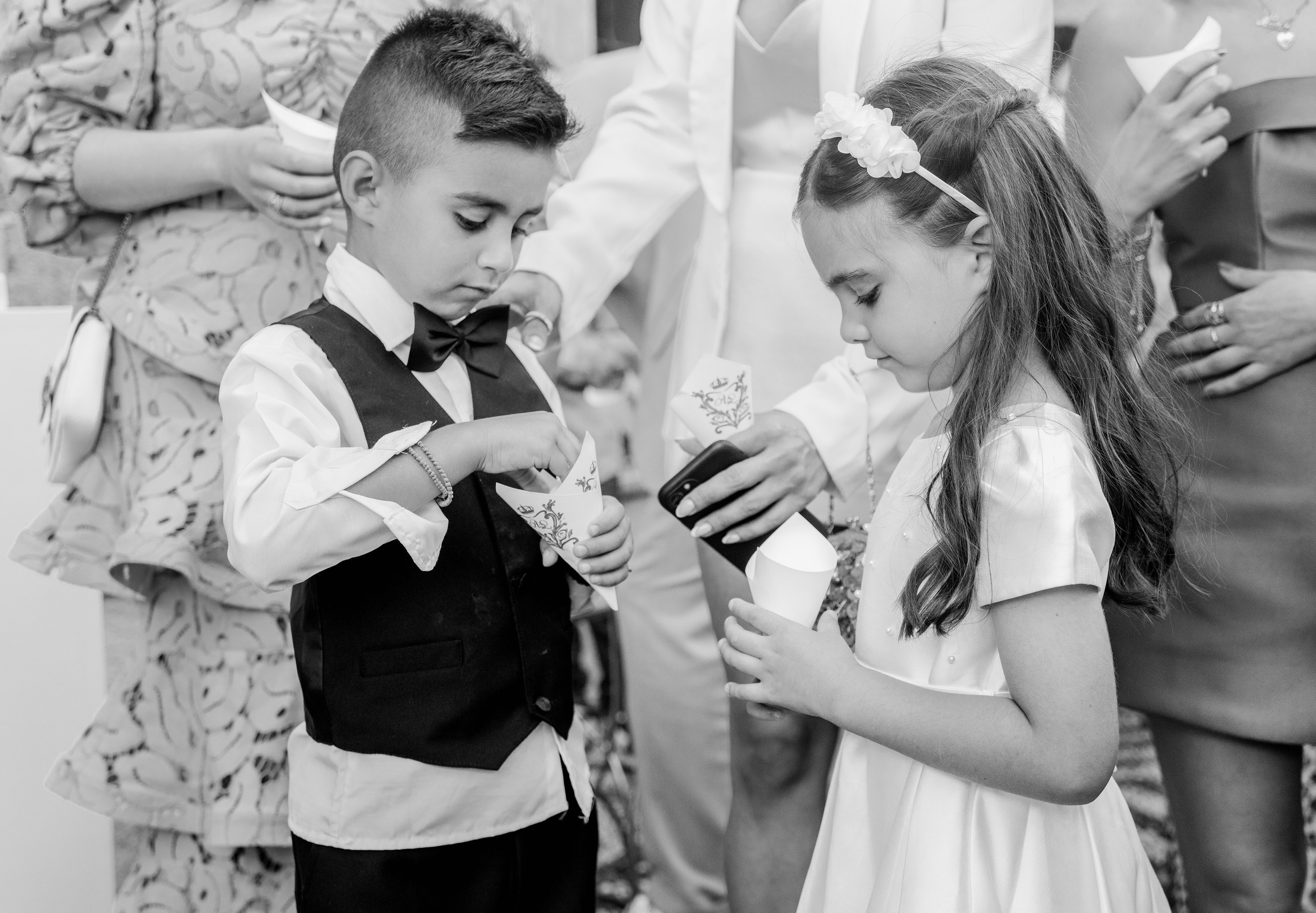 bridesmaids are ready to throw the rice at the bride and groom.  Rhodes Greece