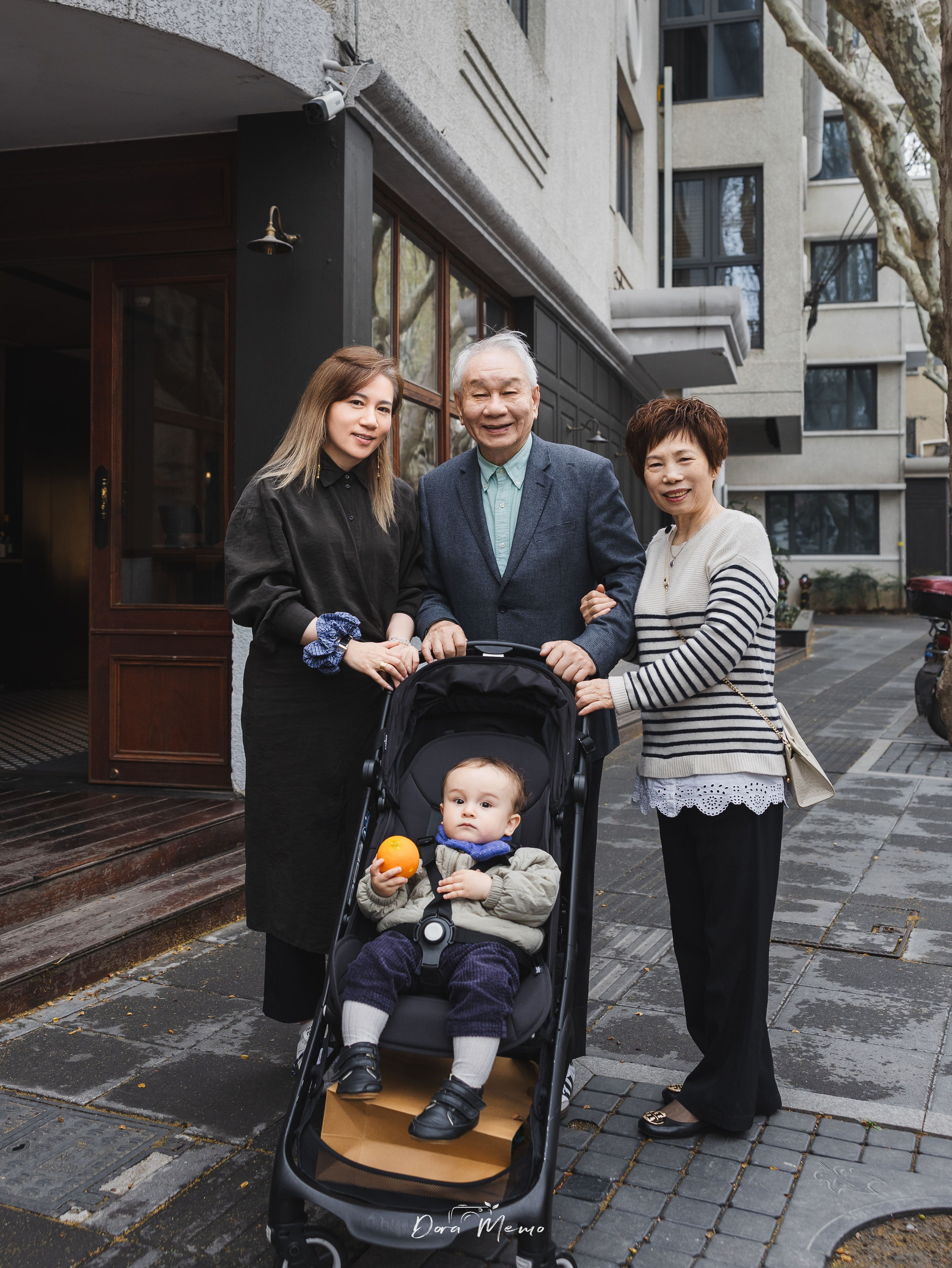 A family portrait of four, taken in Shanghai.
