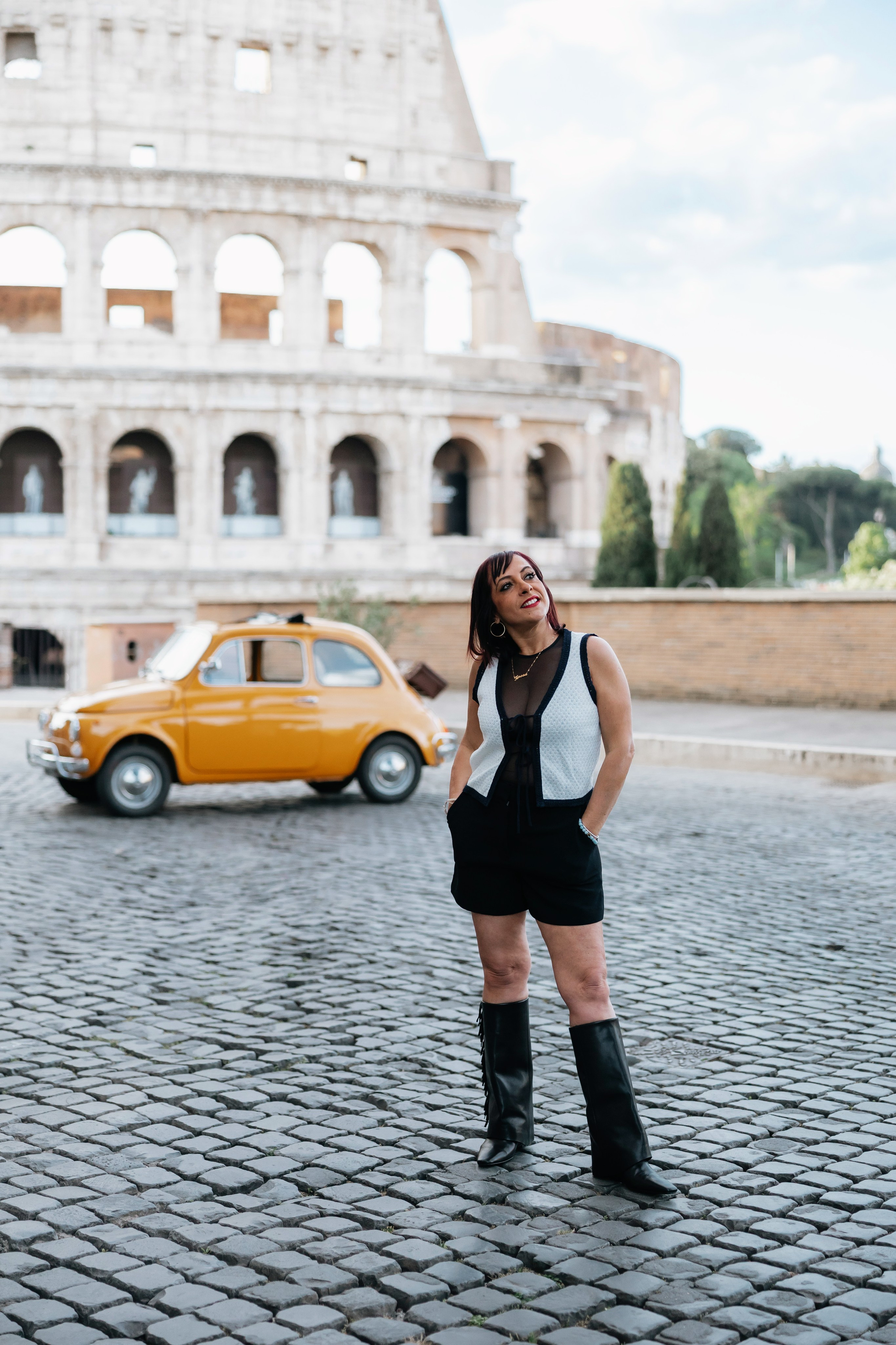 Fiat 500 and Vespa. Photographer in Rome