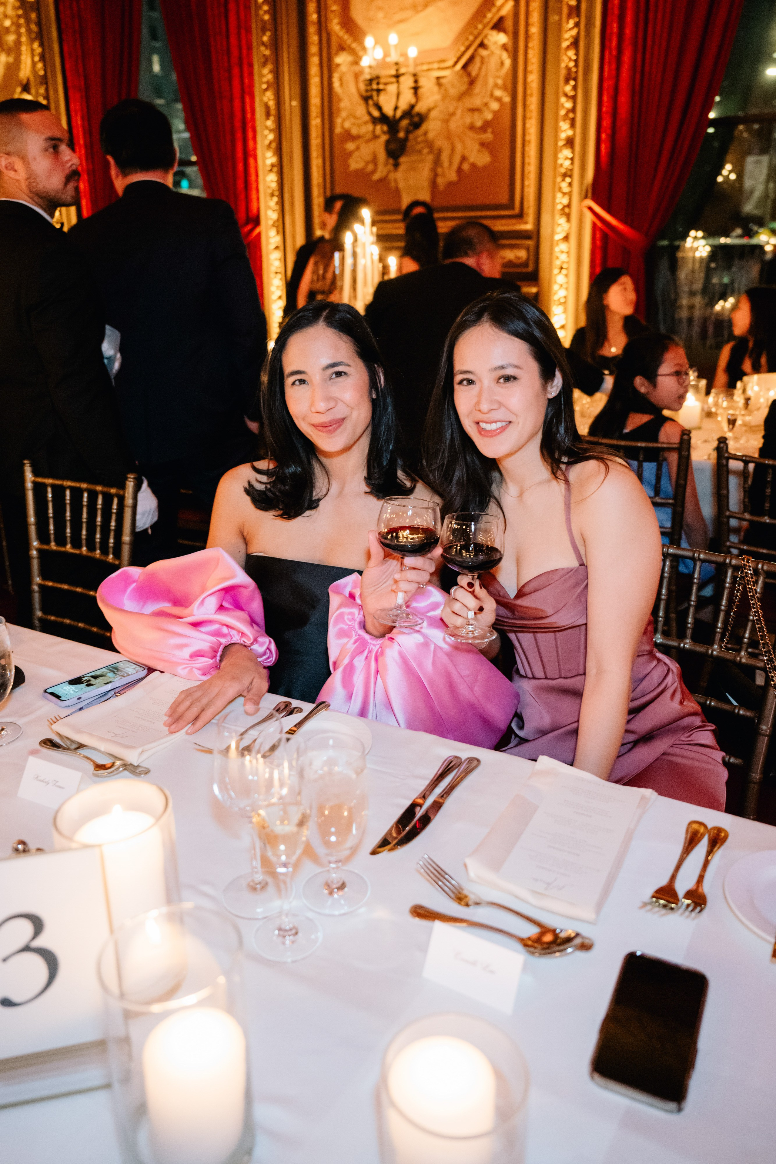 two women sitting at a table