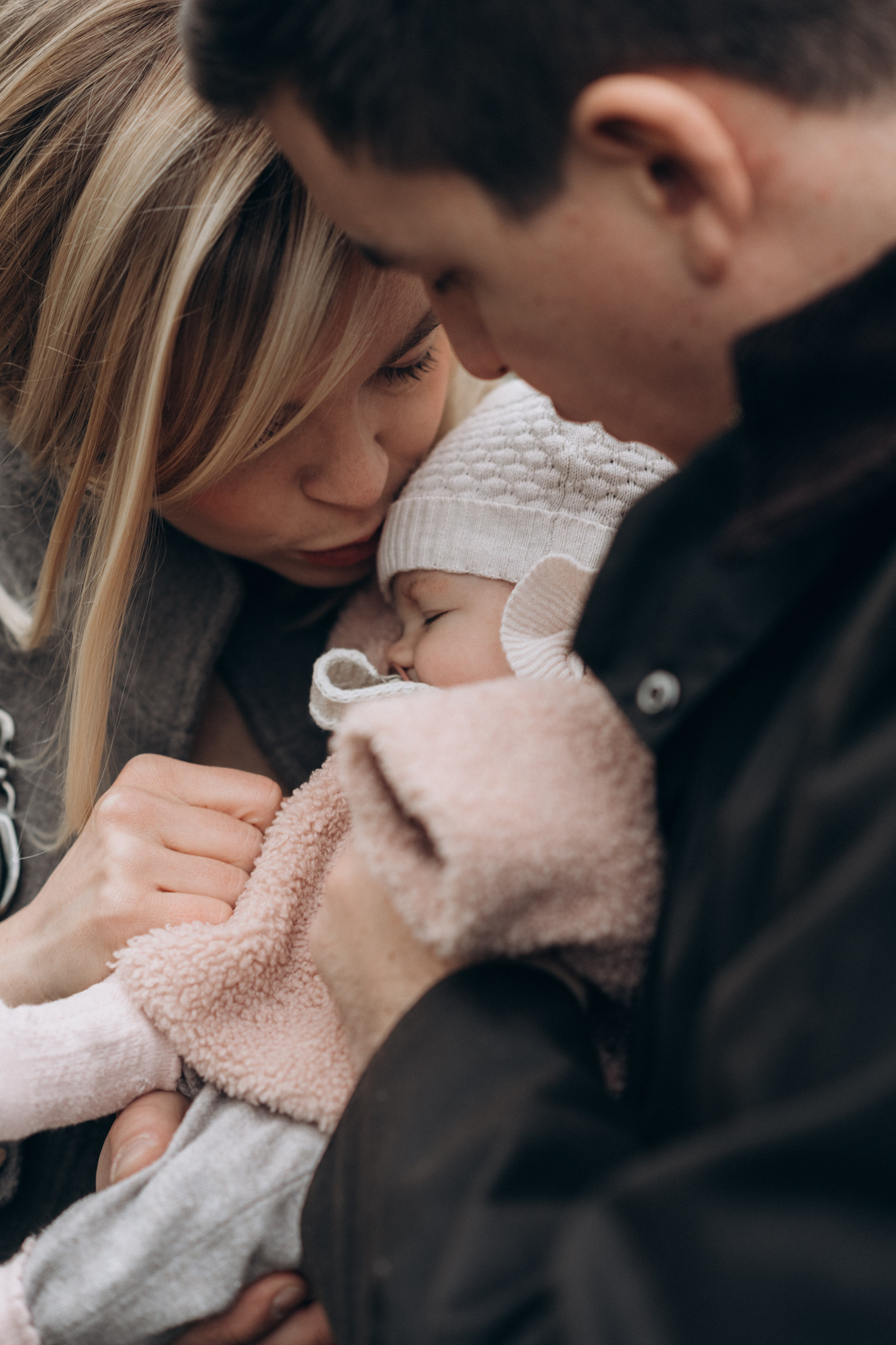 mum kissing her baby 