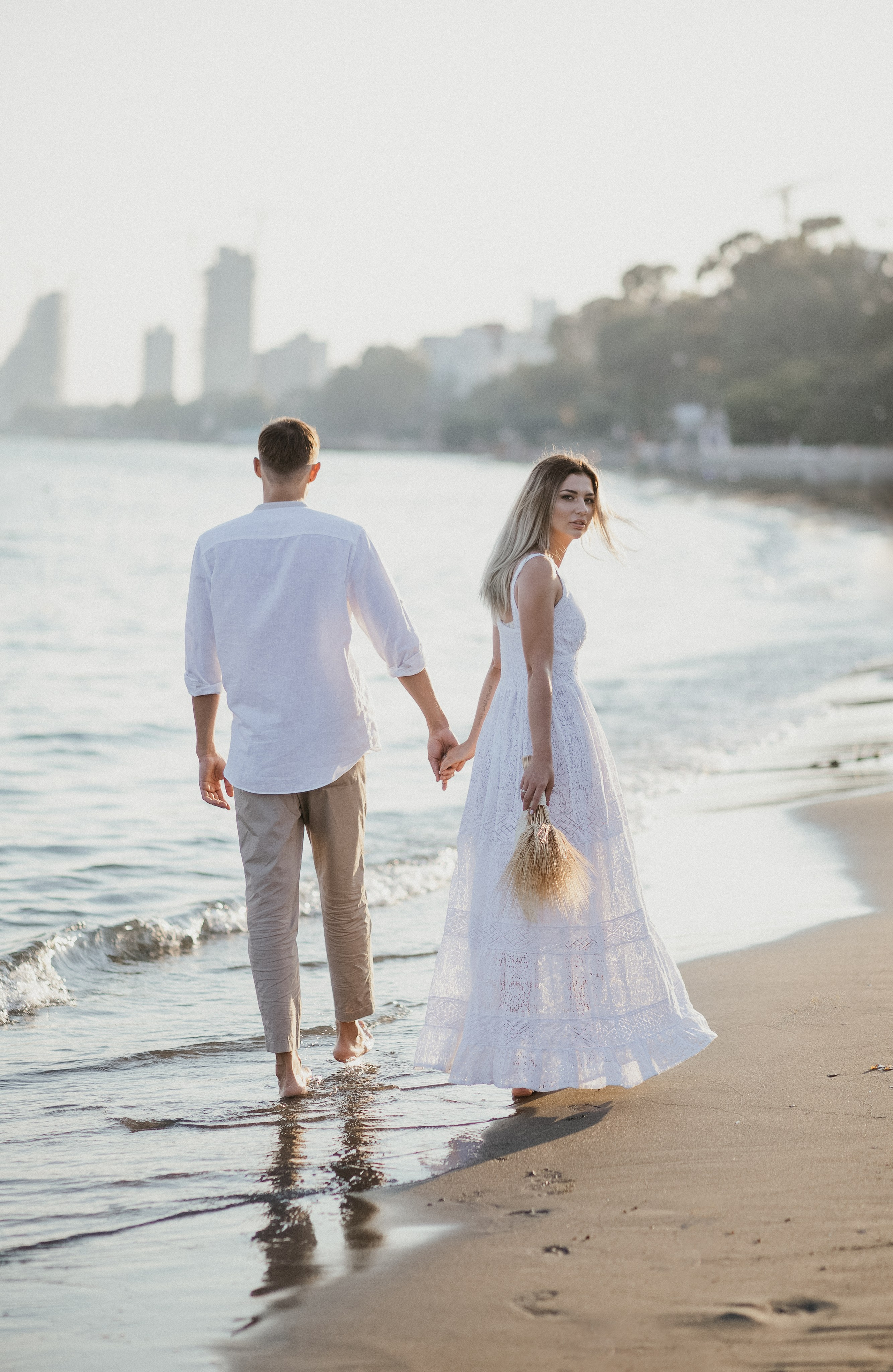 Lovely Young Couple Captured on a Beach Walk Near Limassol | Katya Chu Photography. Photographer in Barcelona capturing unique stories | Kate Chumak
