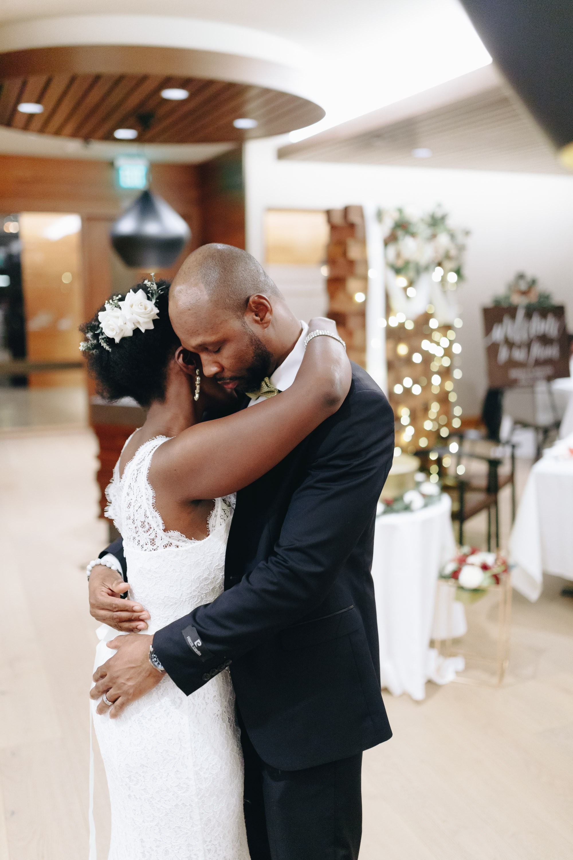 Couple dancing at wedding reception indoors