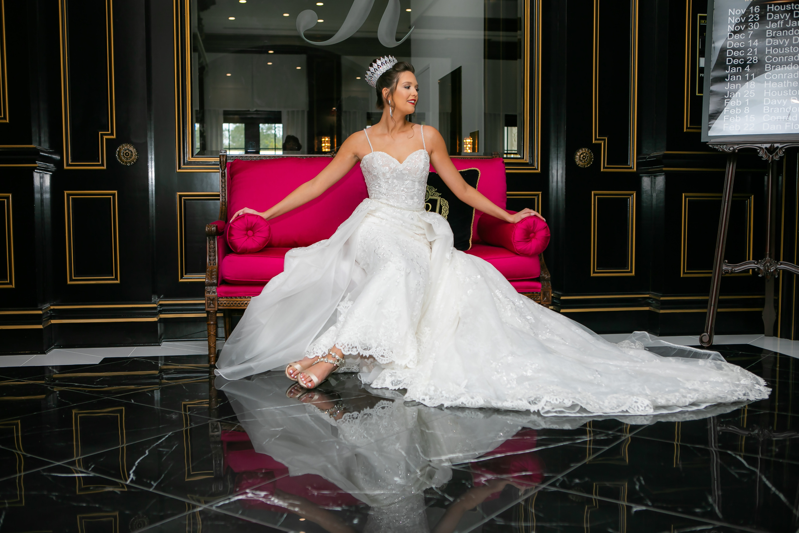 bride on a red sofa and reflection