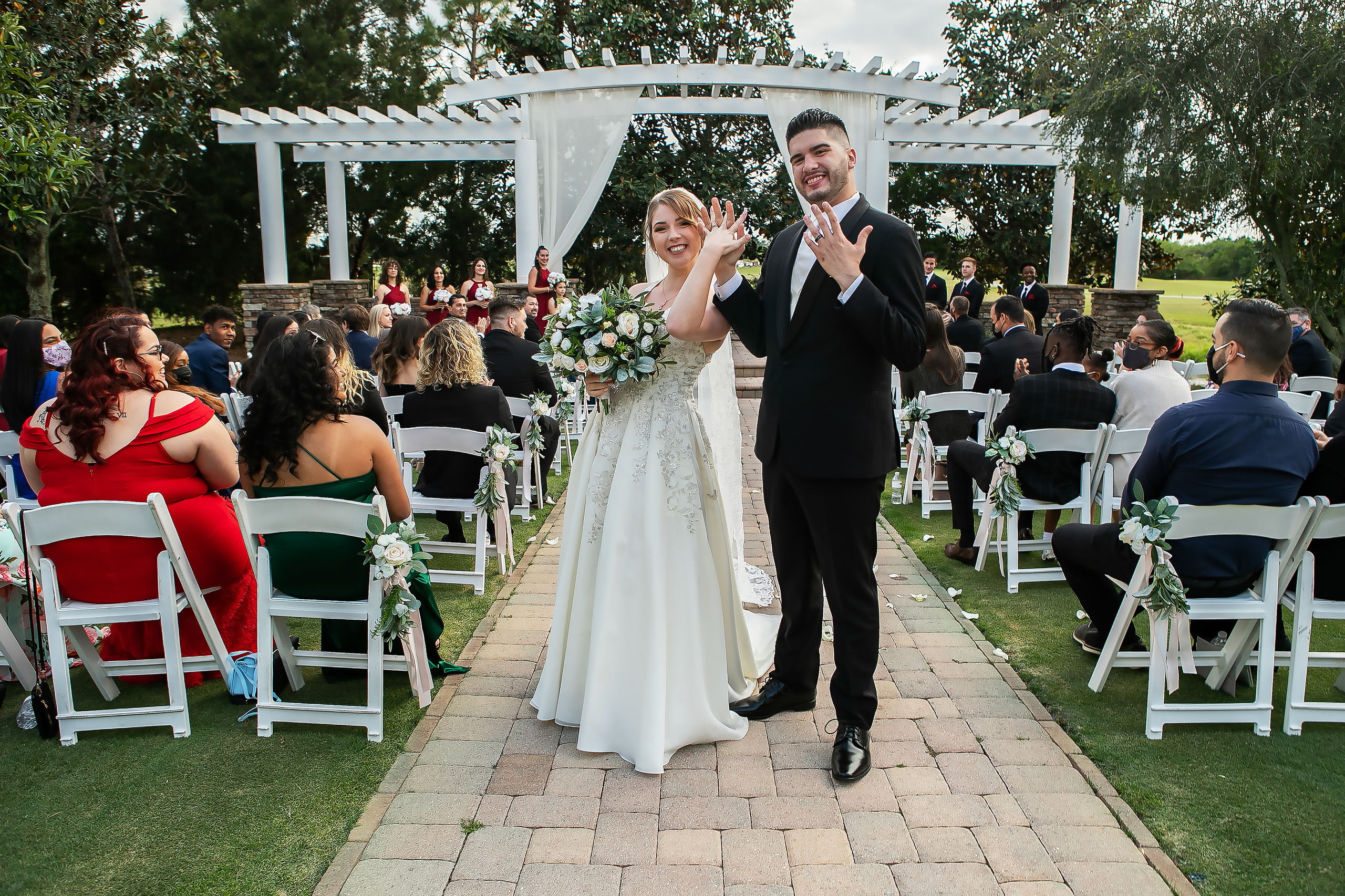 Wedding in the Royal St. Cloud Golf Links genuine moments. Lana Photography — Wedding & Family Photographer in Florida & Beyond
