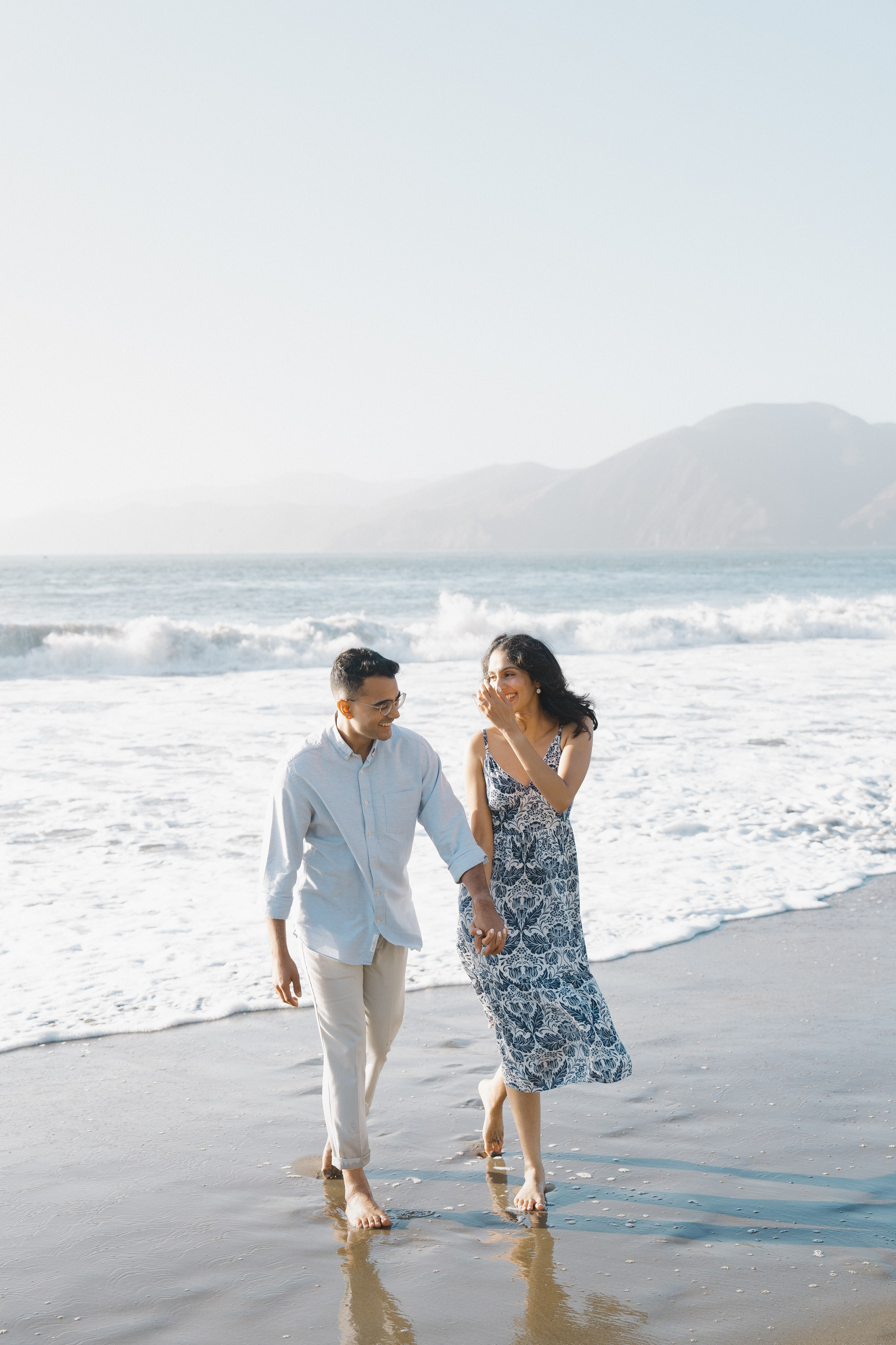 Engagement and Couple’s Photoshoot at Marshall’s Beach with iconic Golden Gate bridge view. Soulo Photography | San Francisco Bay Area Based Photographer