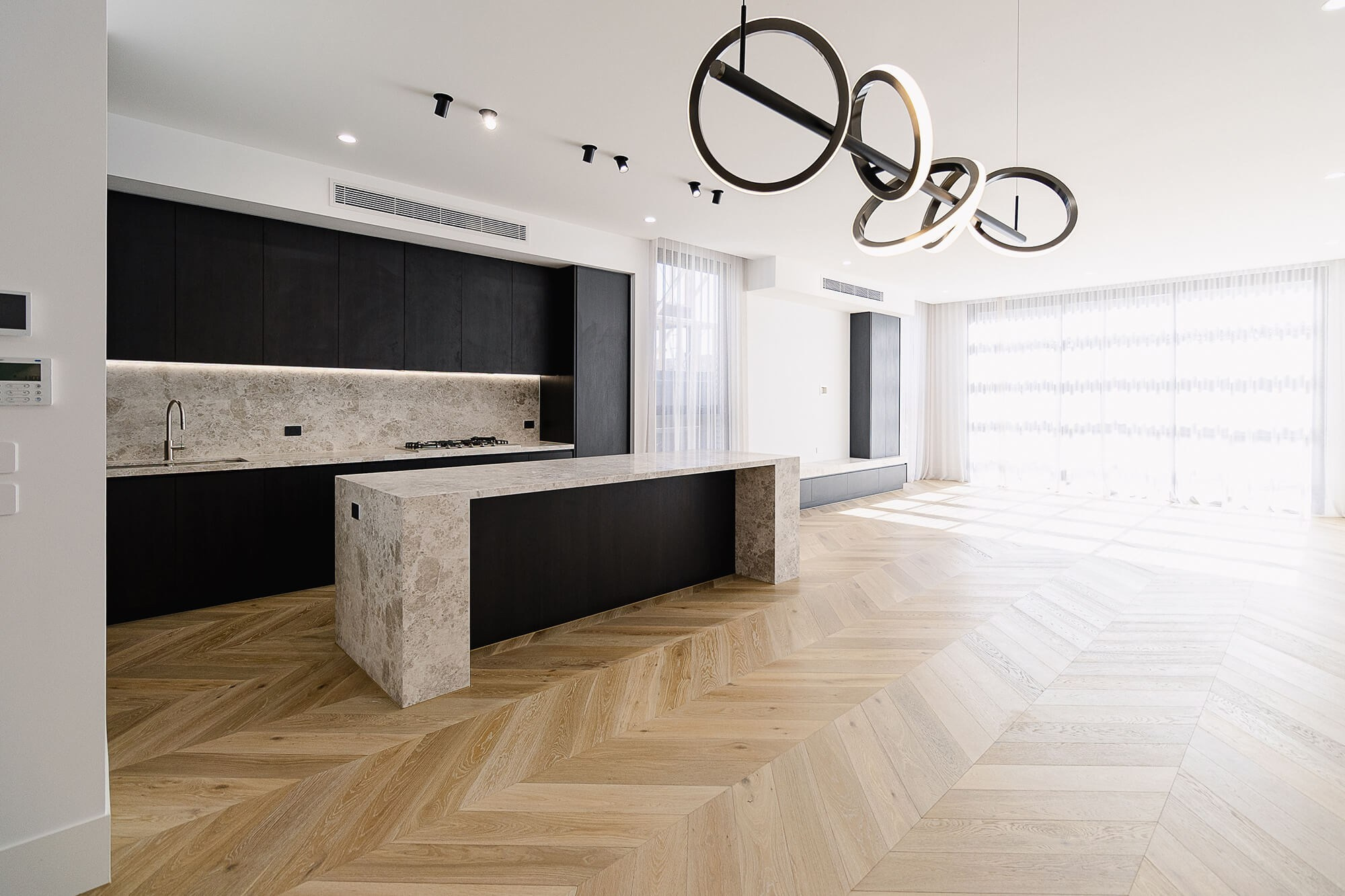 Spacious open-plan kitchen and dining area in Melbourne home