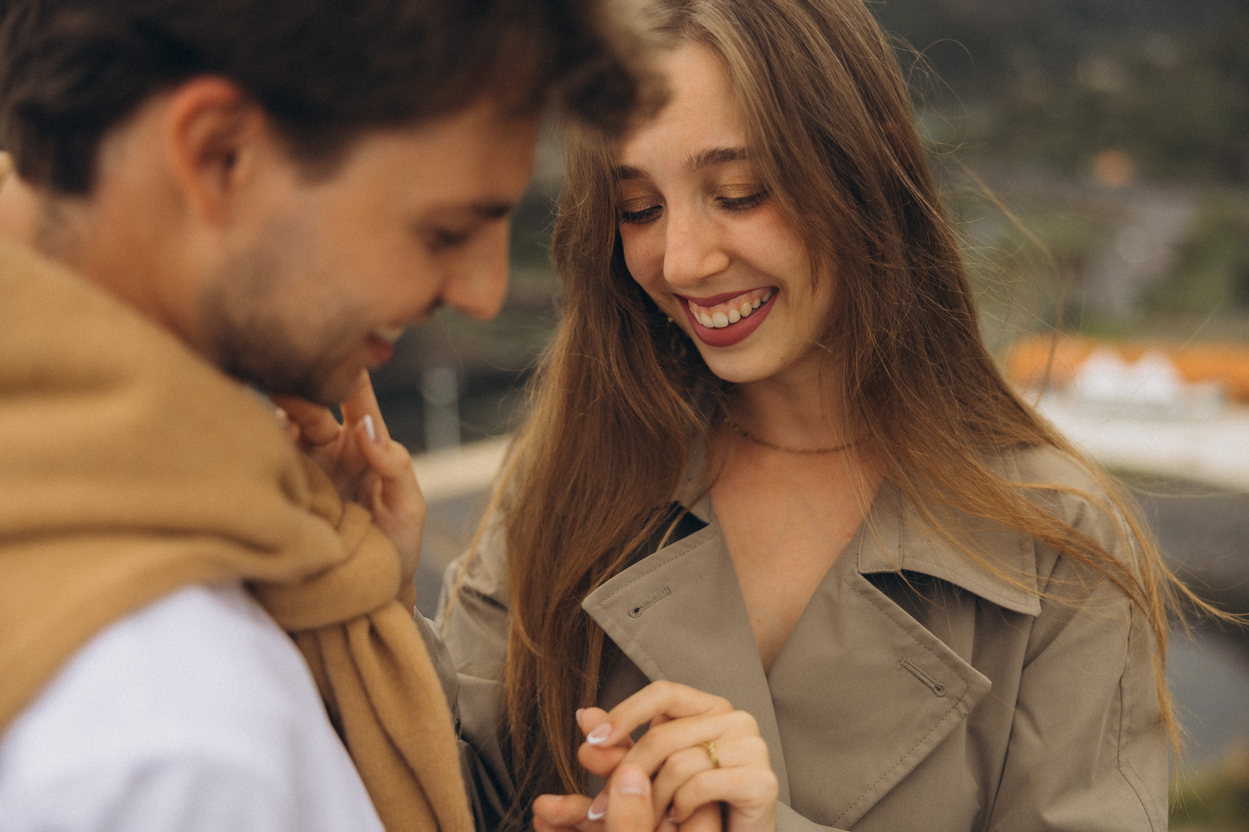 Romantic surprise proposal at sunset on a scenic cliffside in Madeira, Portugal, capturing the emotional moment of love and commitment.
