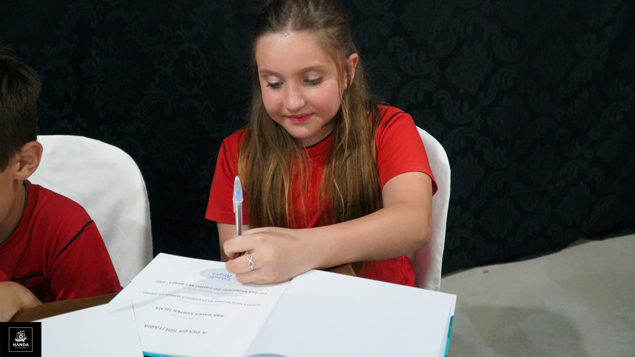 Noite autógrafos colégio Aurélio Buarque de Holanda. Handa Produções