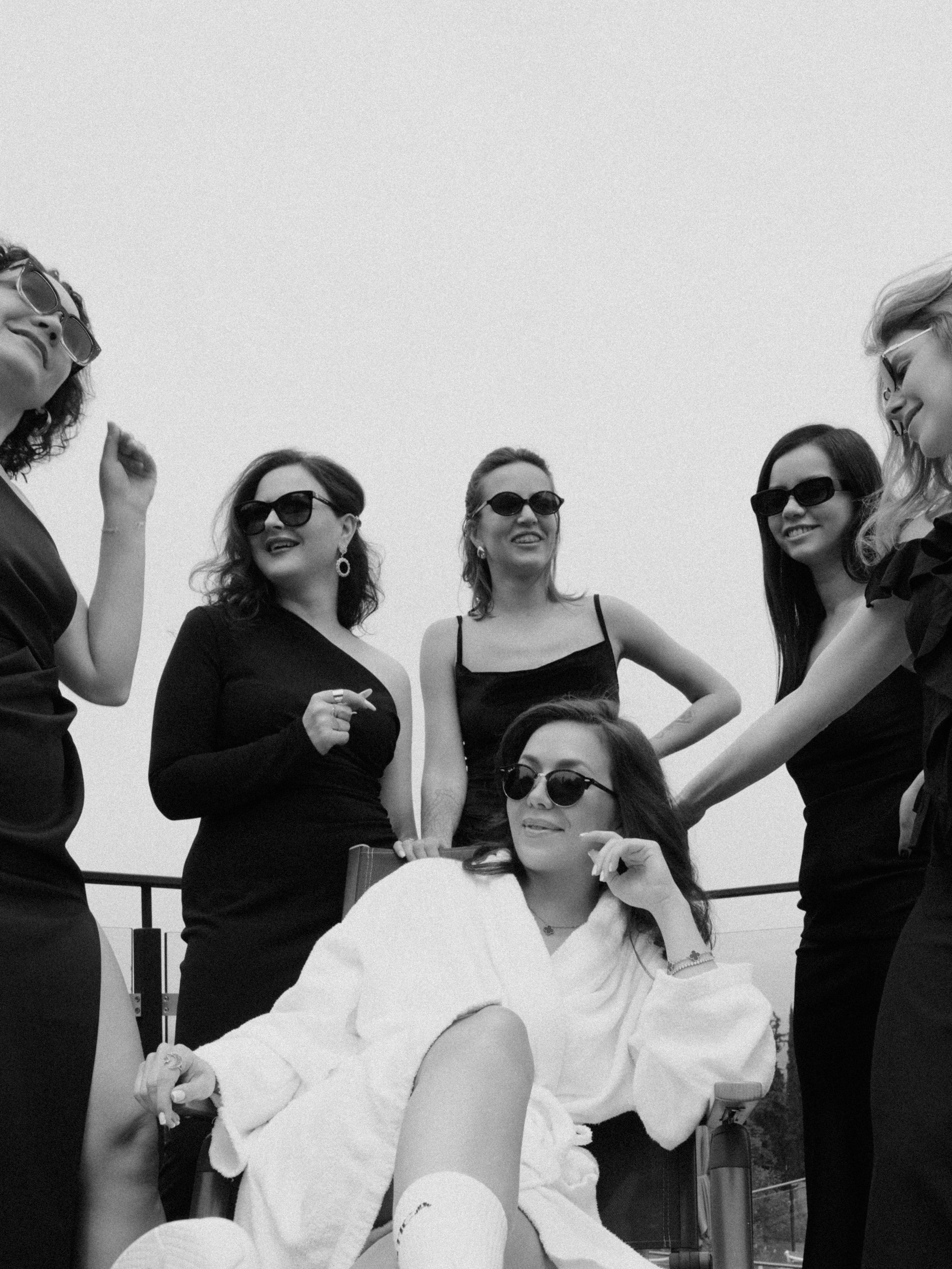 Bride with bridesmaids celebrating together