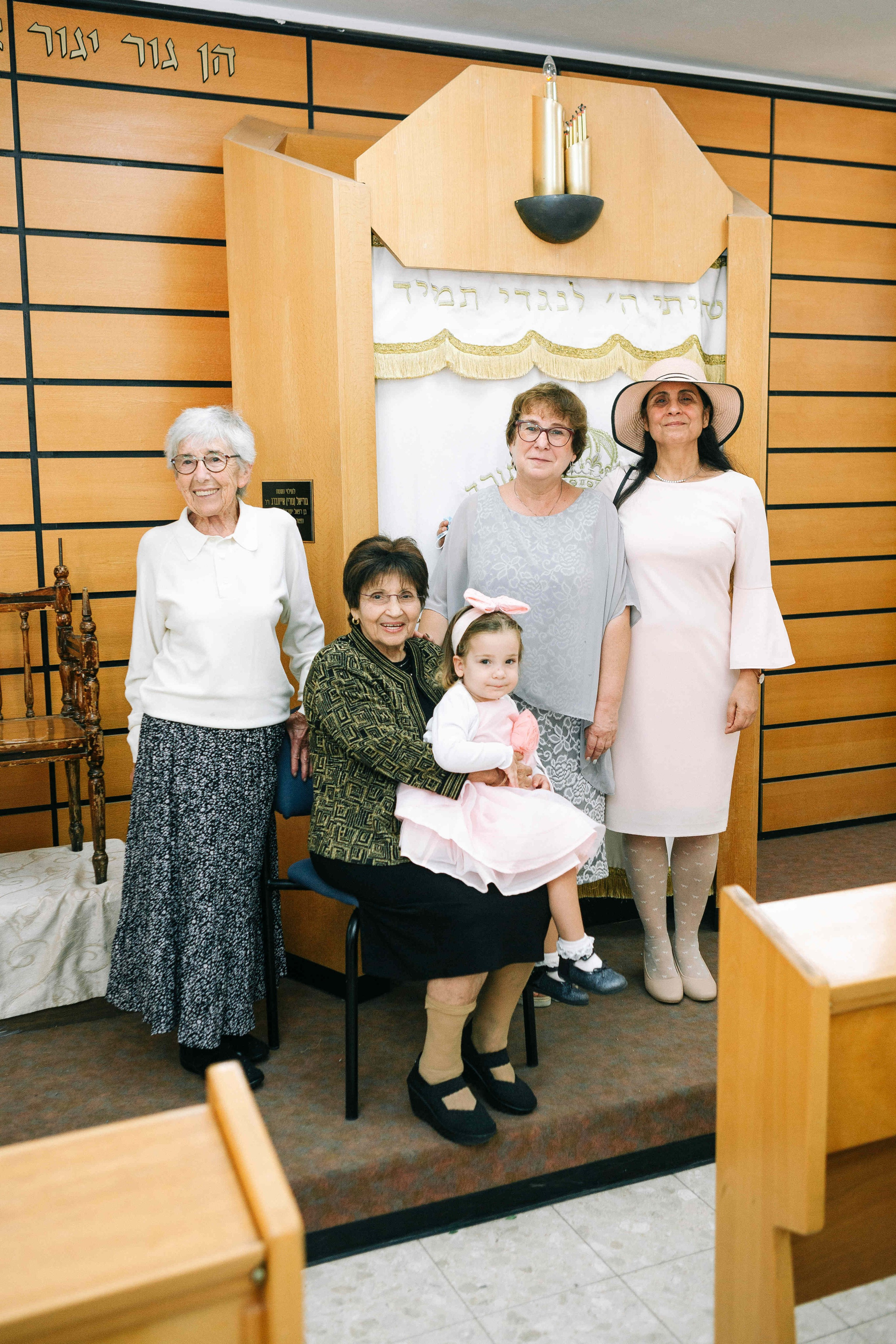 BRITH MILA IN THE SMALL SYNAGOGUE. PHOTOGRAPHER IN ISRAEL