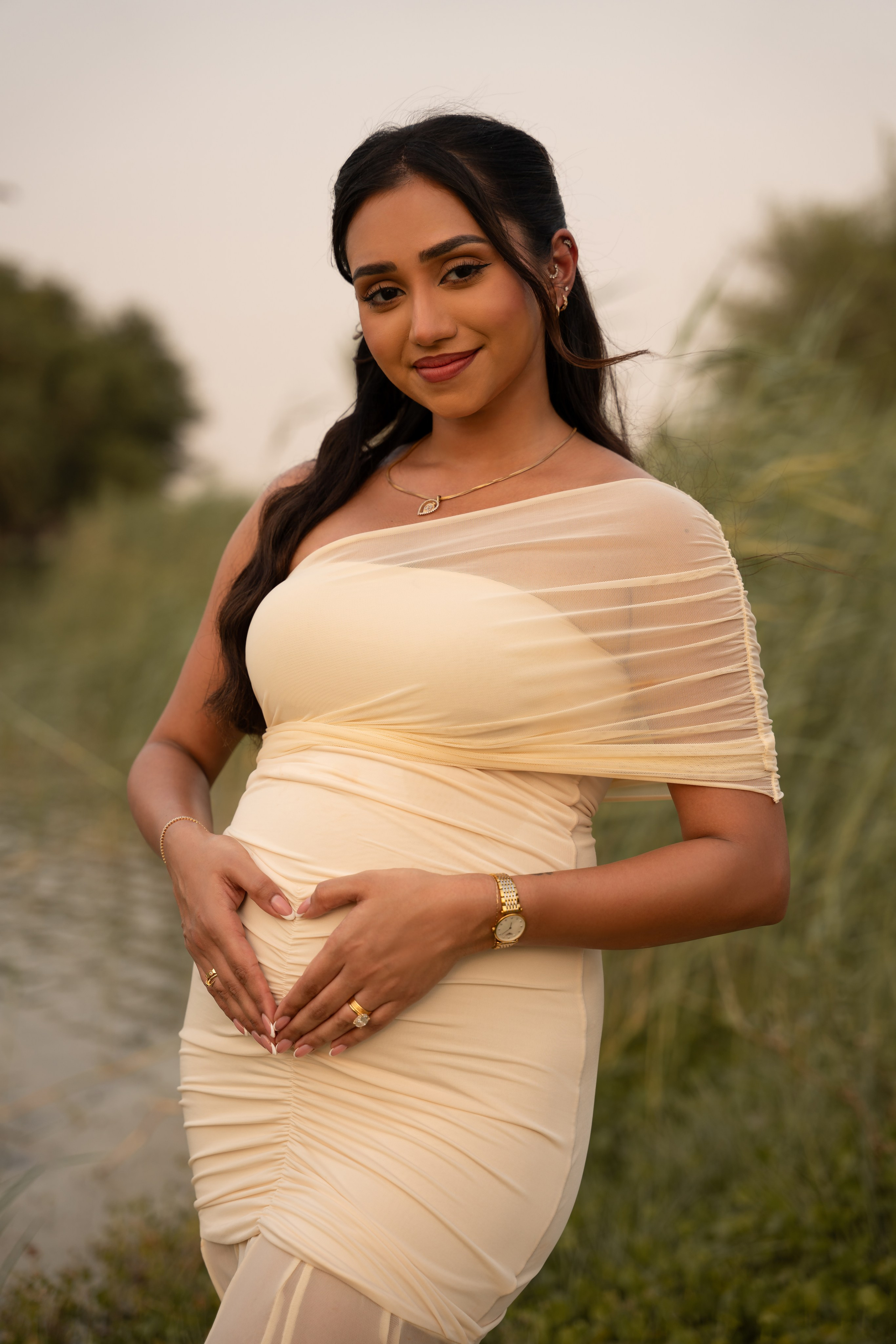 Sunset whispers: Boy or Girl?. Angela Iakovleva — Family Photographer in Dubai