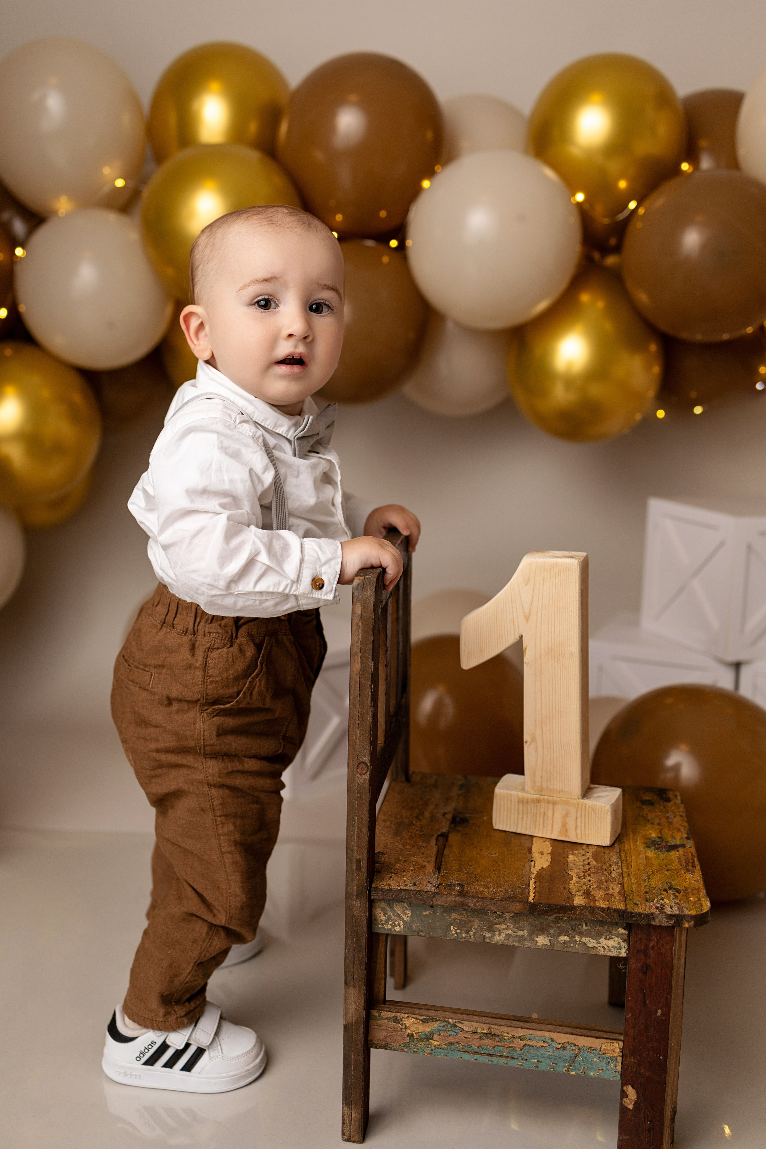Erste Geburtstag „Cake Smash“. Neugeborene- Schwangerschaft- und Kinder Fotografin in Lehre
