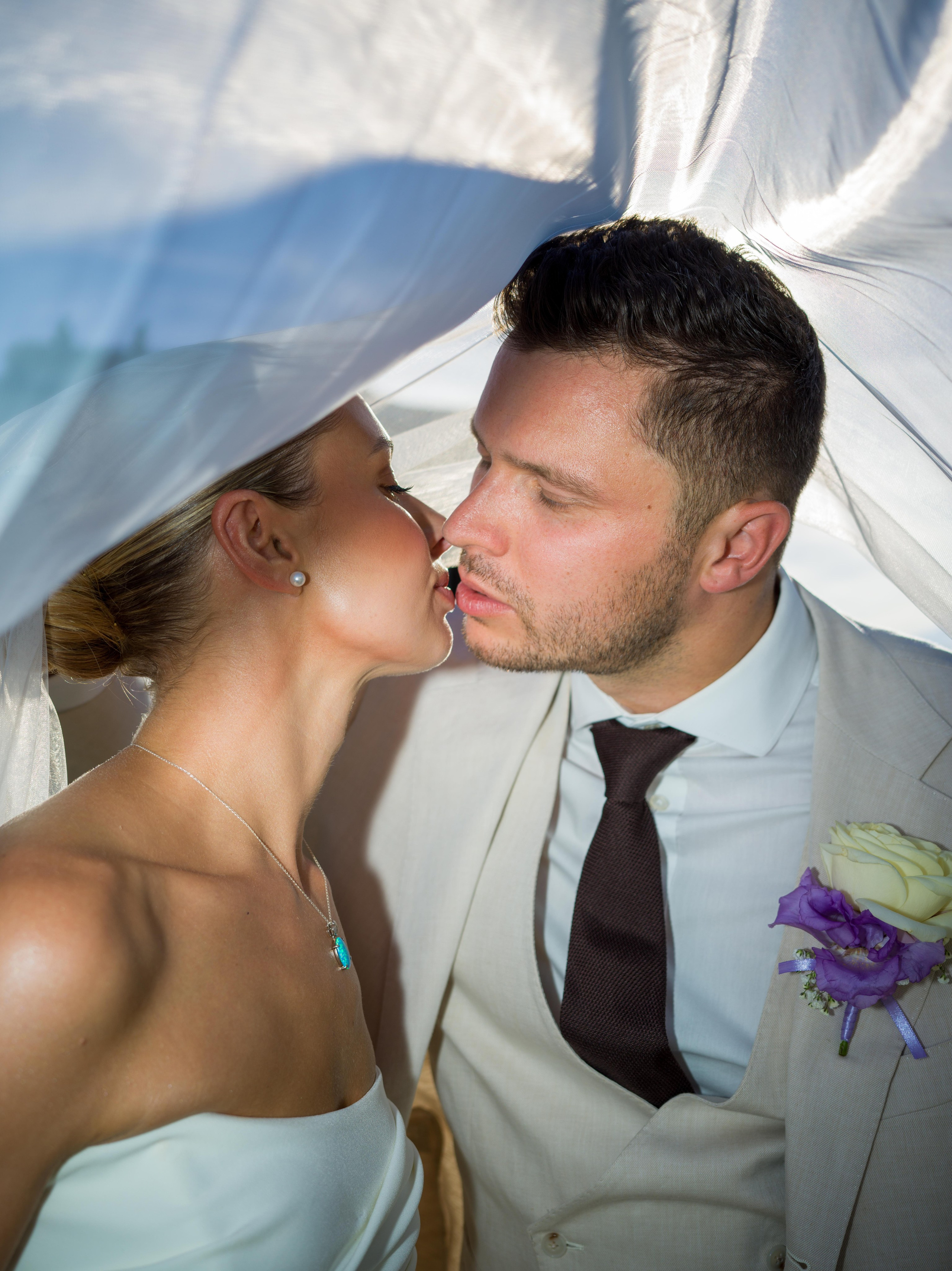 An elegant Tuscan wedding filled with warm light and natural beauty. Fine art wedding photo