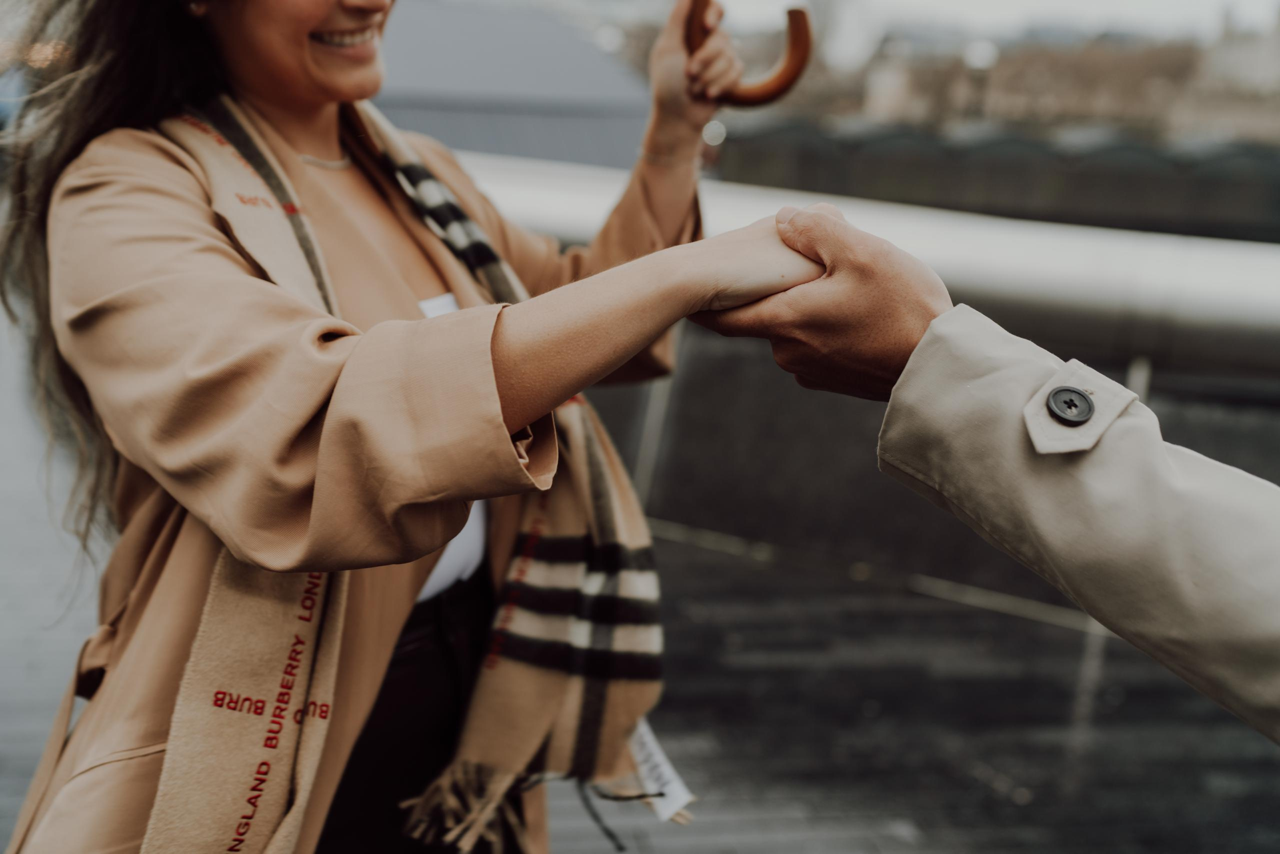 Rainy photo walk by Tower Bridge. London portrait and family photographer