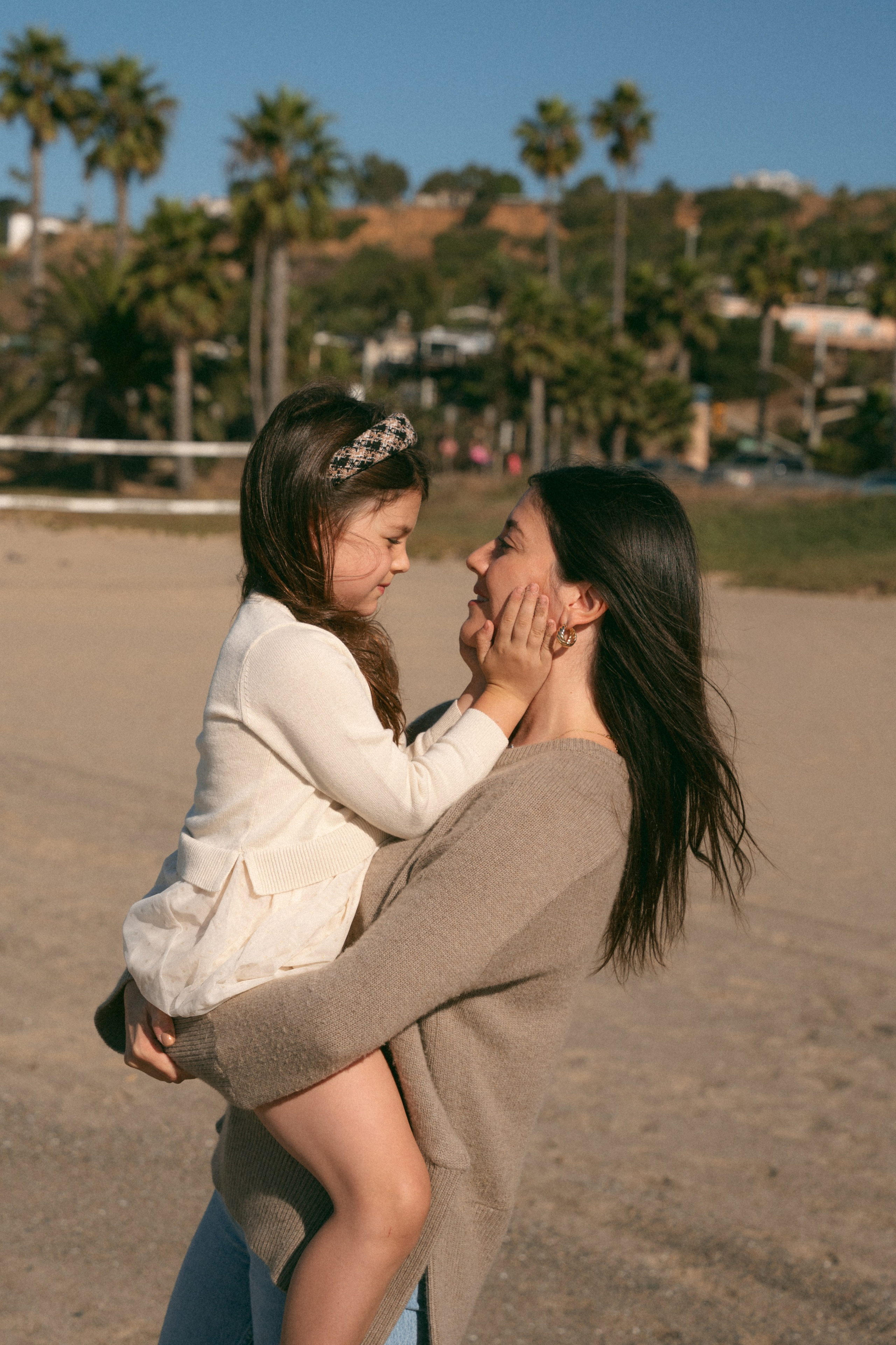 Family photoshoot. Family photoshoot outside. Beach photoshoot. Family holiday photoshoot. Sunset photoshoot