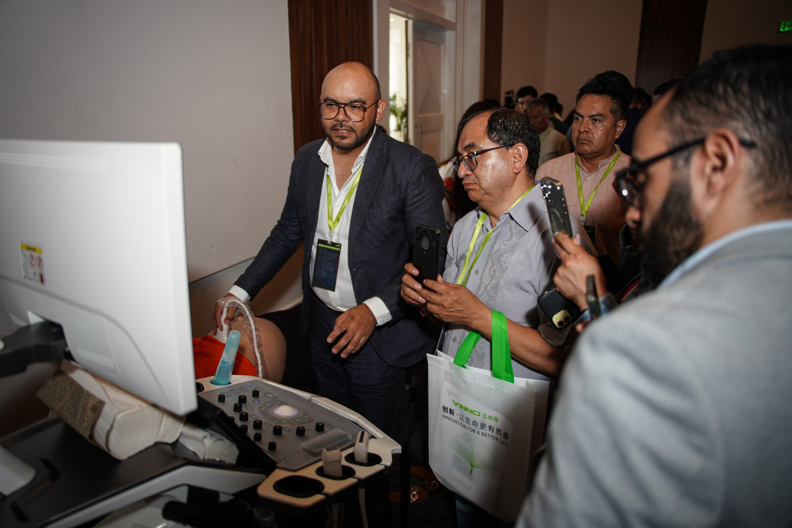 Presenter conducting close-up demo of newly released medical equipment.