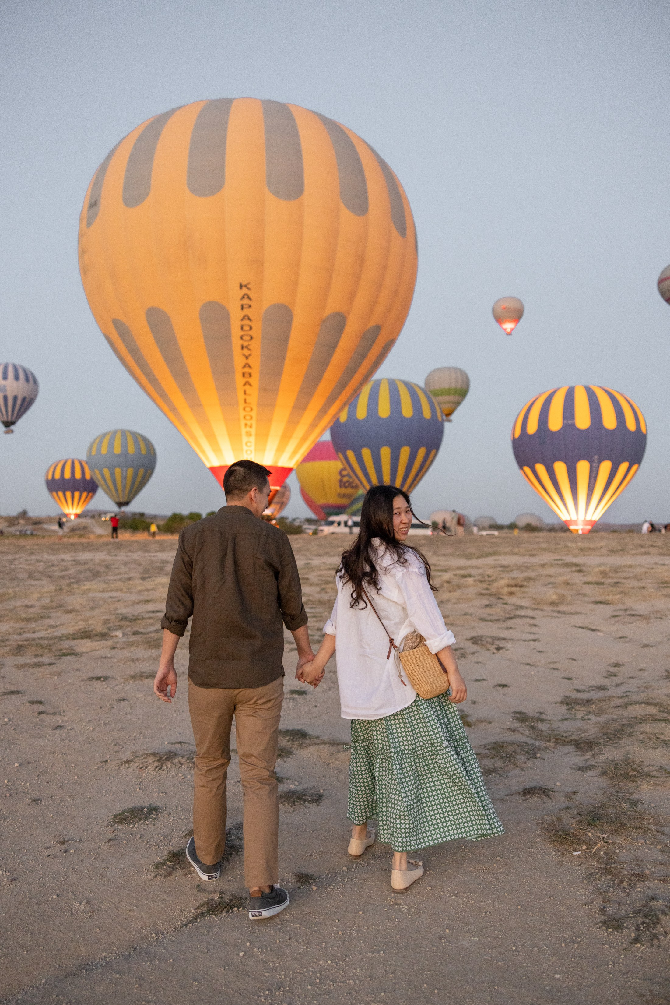 Romantic Love Story Photoshoot with Hot Air Balloons in Cappadocia. Julia Ganch I Fashion Wedding Photography I Cappadocia Turkey