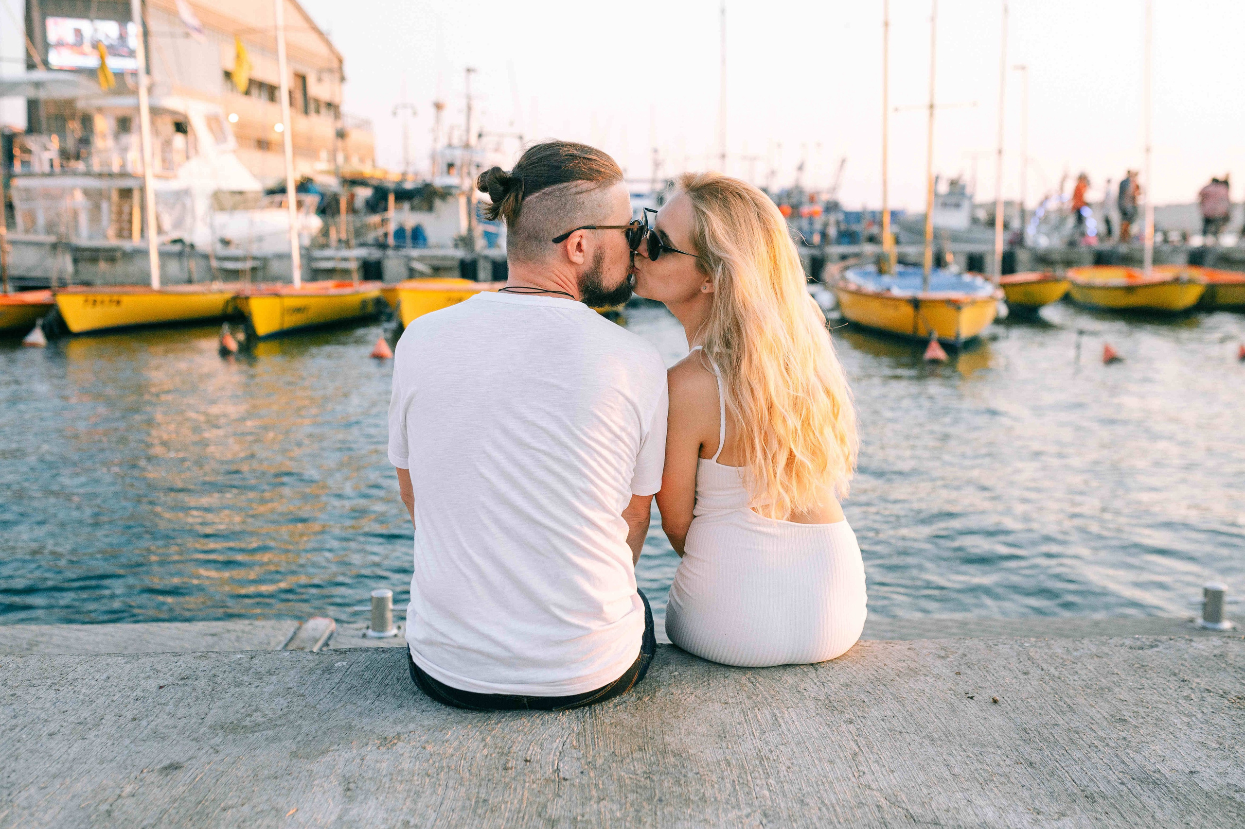 SUNSET IN JAFFO PORT. PHOTOGRAPHER IN ISRAEL