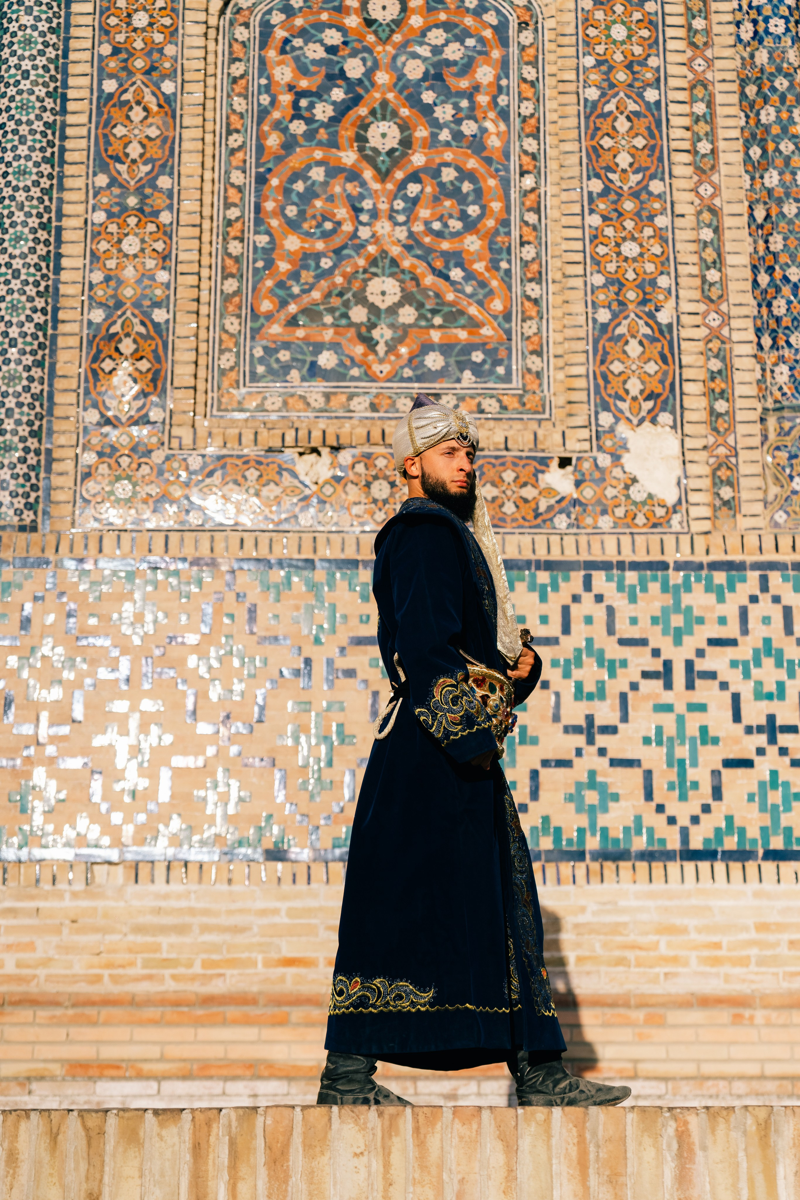 Man in national costume in the old city of Bukhara