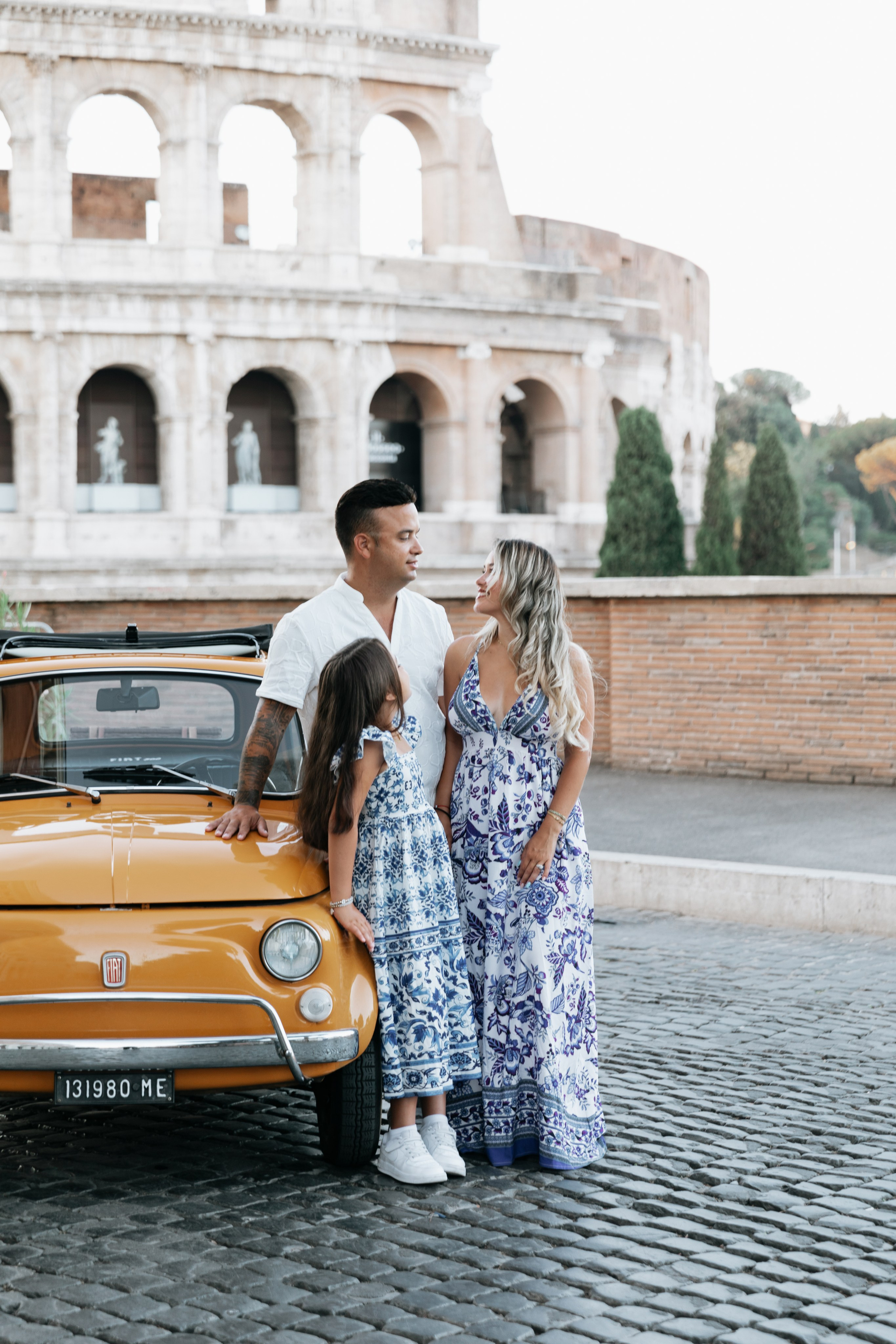 Fiat 500 and Vespa. Photographer in Rome