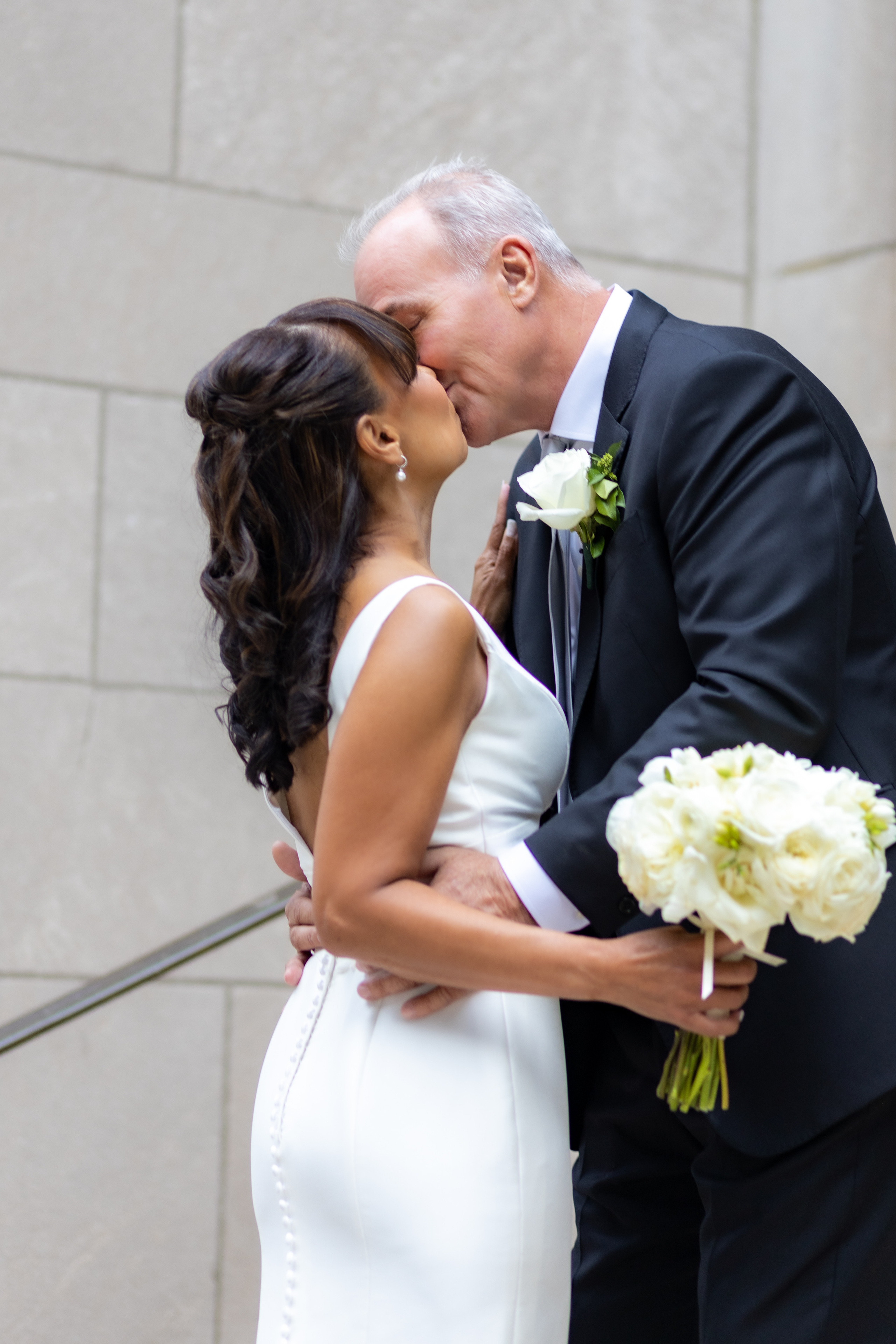 Marlene and Michael. Wedding and Event photography, Kisses + Veil