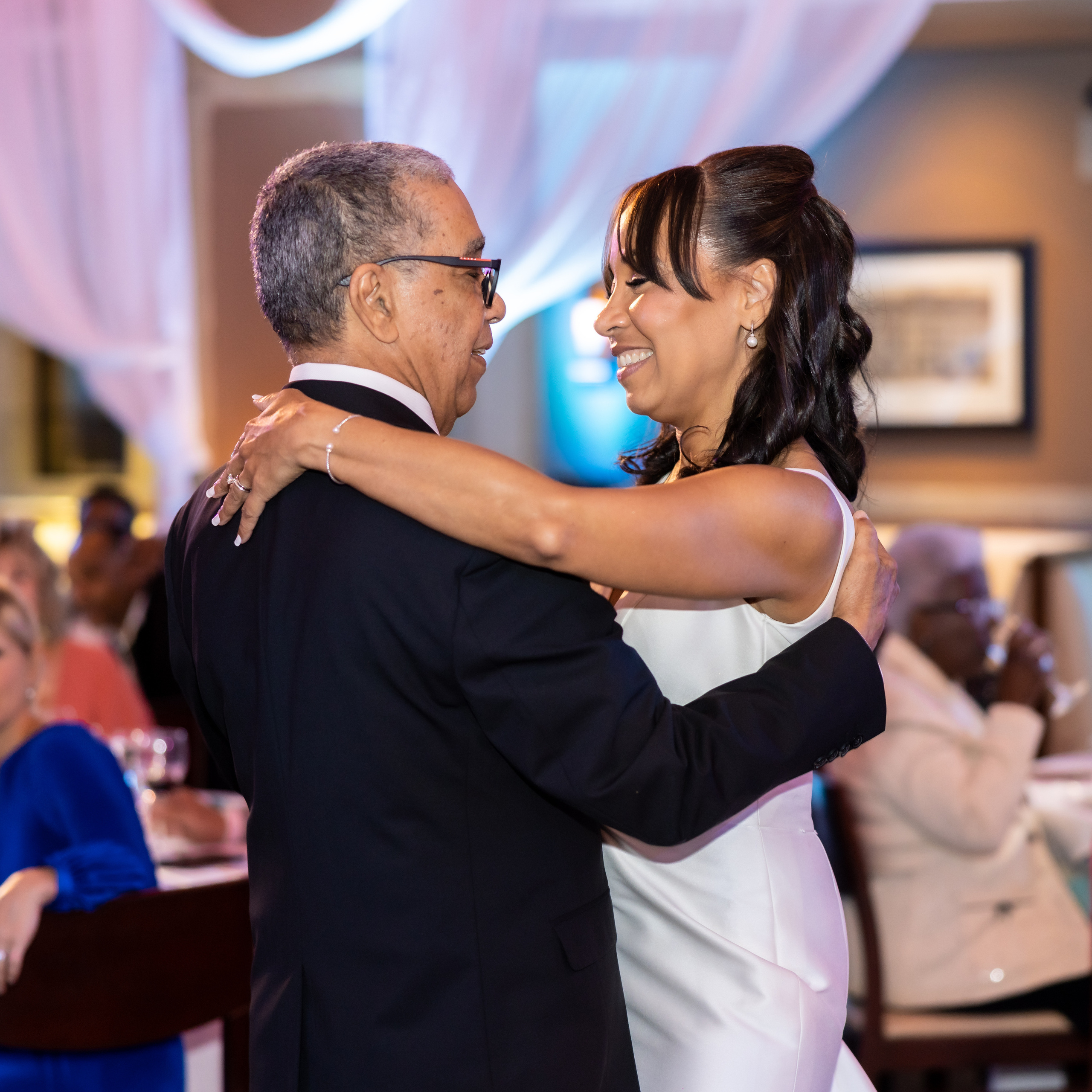 Marlene and Michael. Wedding and Event photography, Kisses + Veil