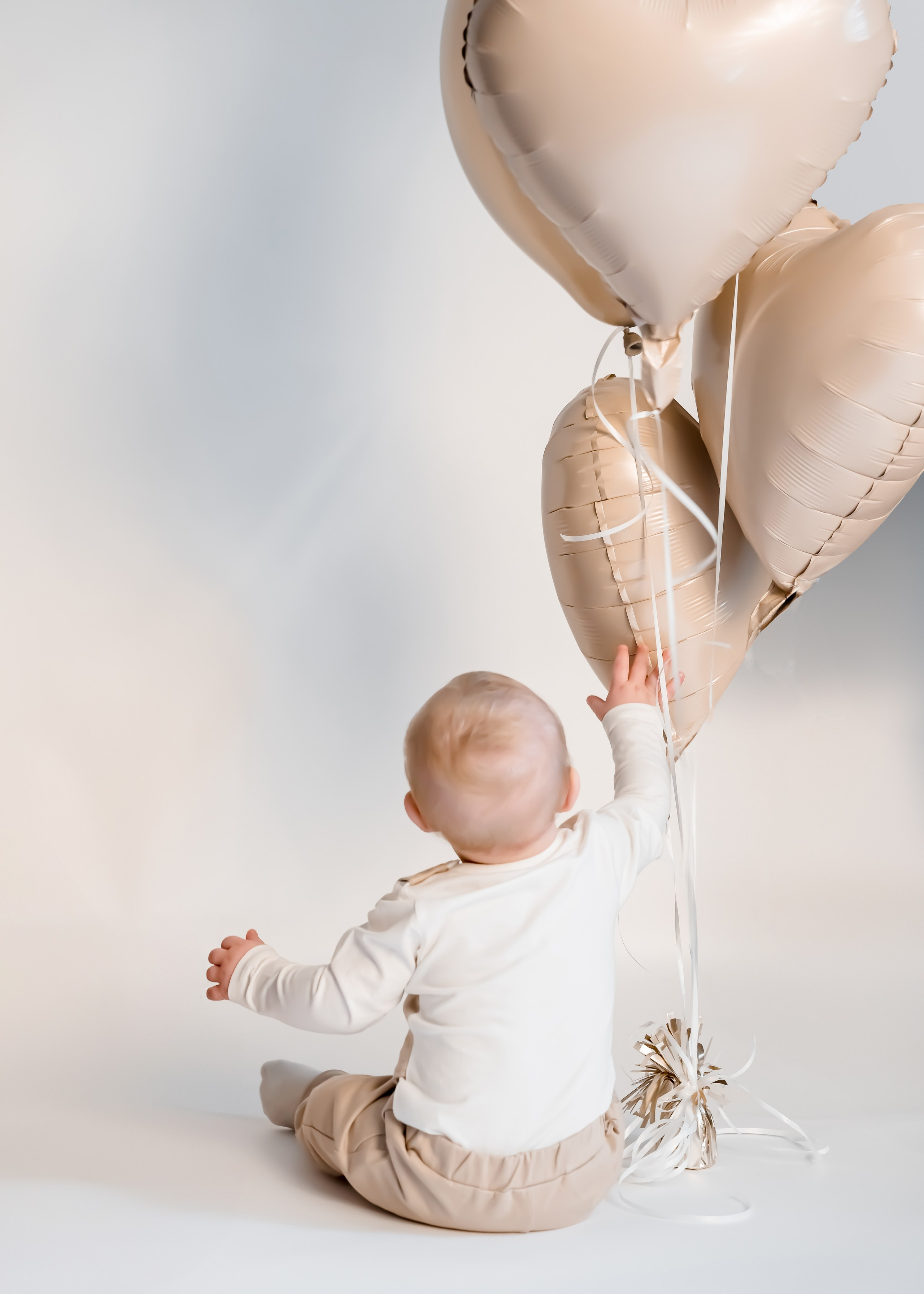 Firar 10 månader. Family and portrait photographer Natalja Biteniece