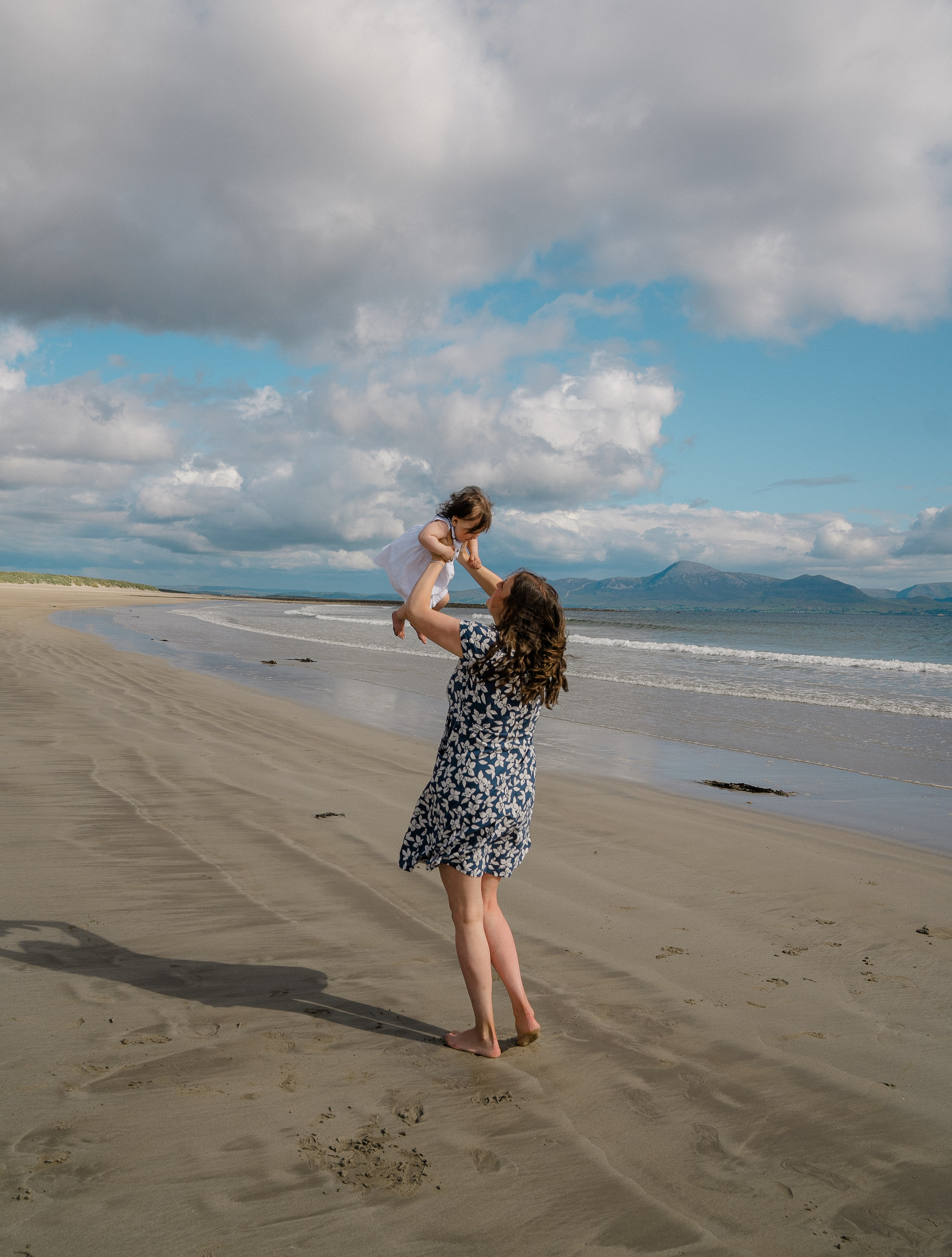 Darya and Mia at the ocean. Wedding and family photographer Ireland