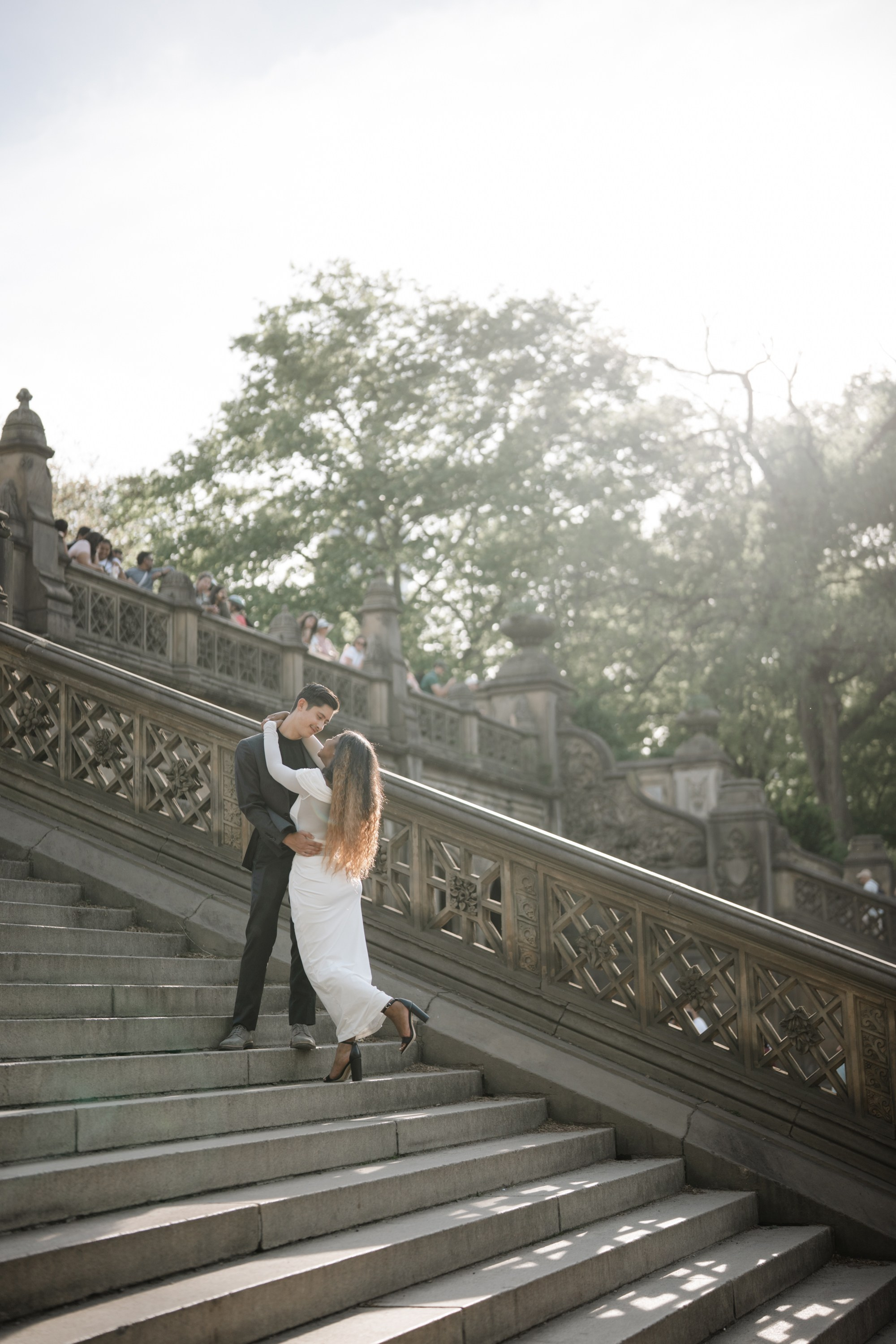 Engagement photo shoot in Central Park in spring. Portrait and wedding photographer in New York