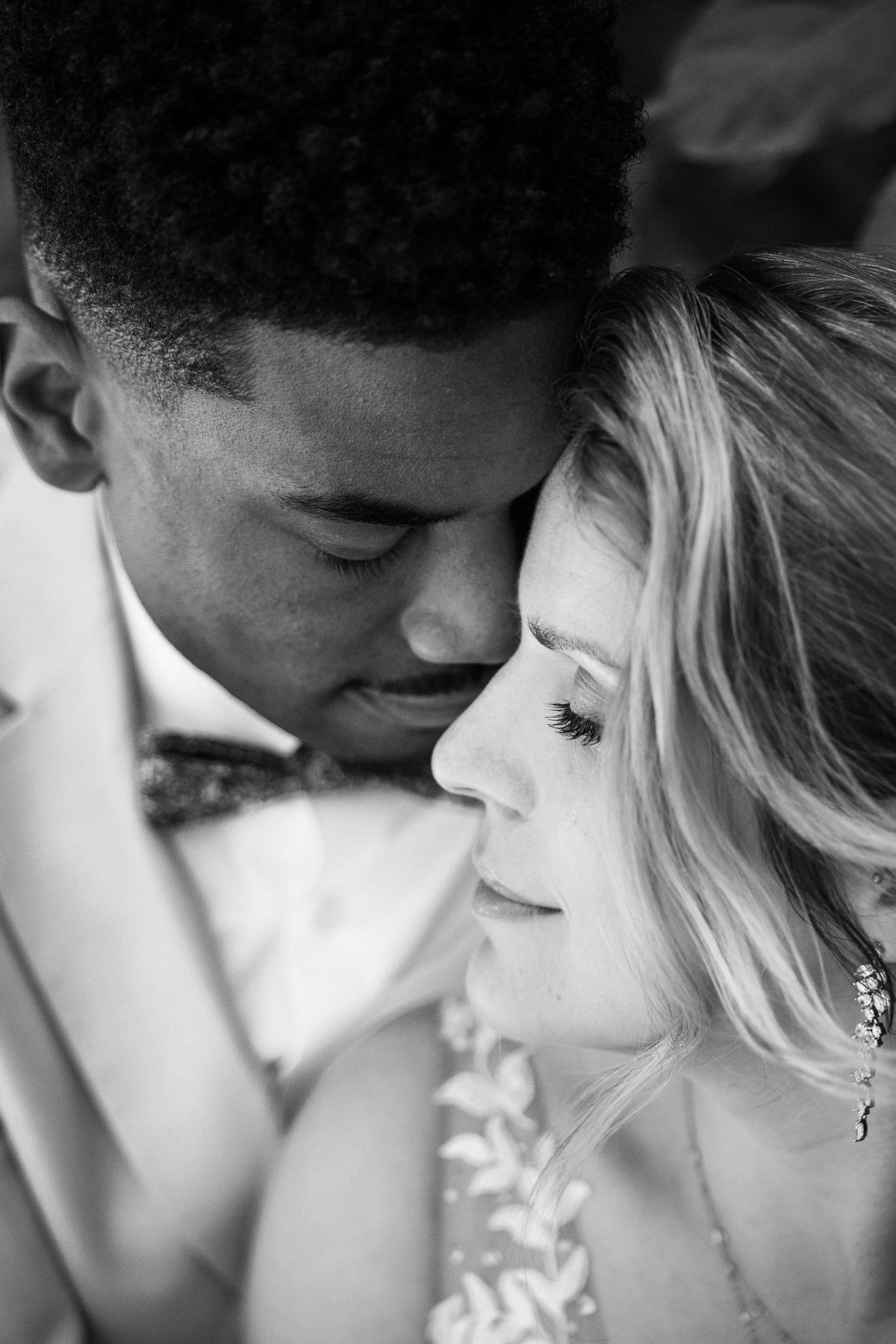 Elegant wedding portrait of bride and groom walking through the streets of ParisRomantic elopement moment captured in soft evening light in Paris, FranceLuxury wedding ceremony setup in a historic French venue with natural floralsCandid black and white photo of a couple at their city wedding in London, UKTimeless couple portrait in front of Marylebone Town Hall, LondonEditorial-style bridal preparation in a classic townhouse in the heart of LondonSoft light bridal portrait in a countryside château wedding in FranceFine art flat lay with French-inspired wedding details and vintage texturesCinematic golden hour photo at a UK estate wedding with historic architectureLuxury wedding tablescape with candles and florals at a London reception
