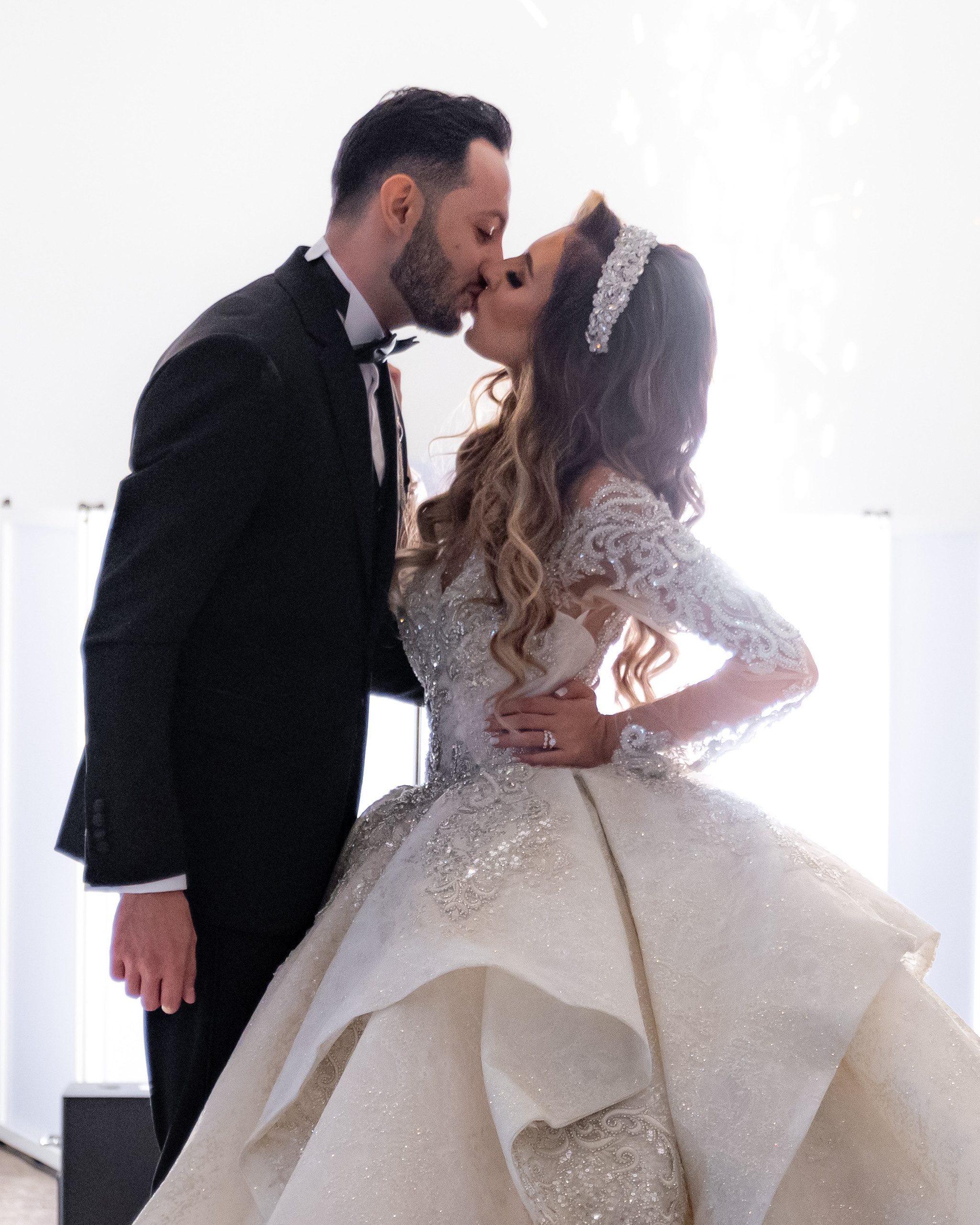 Natalie and Ghasan. Wedding and Event photography, Kisses + Veil