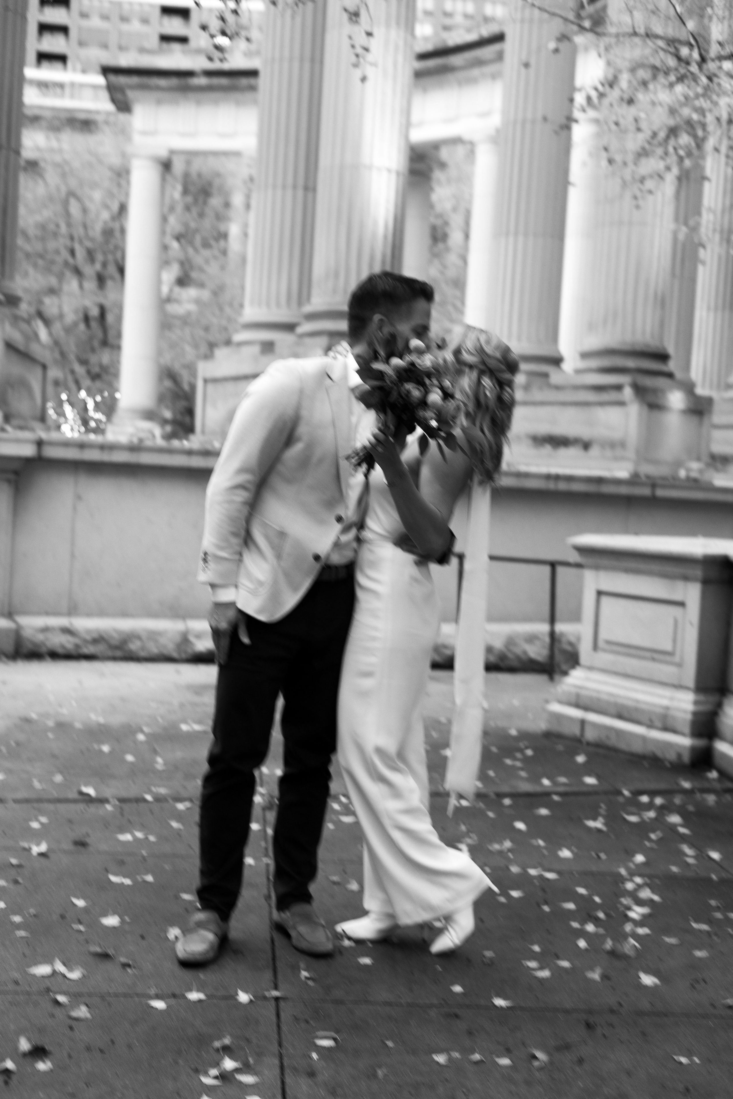 Elegant wedding couple photographed in downtown Chicago cityscape