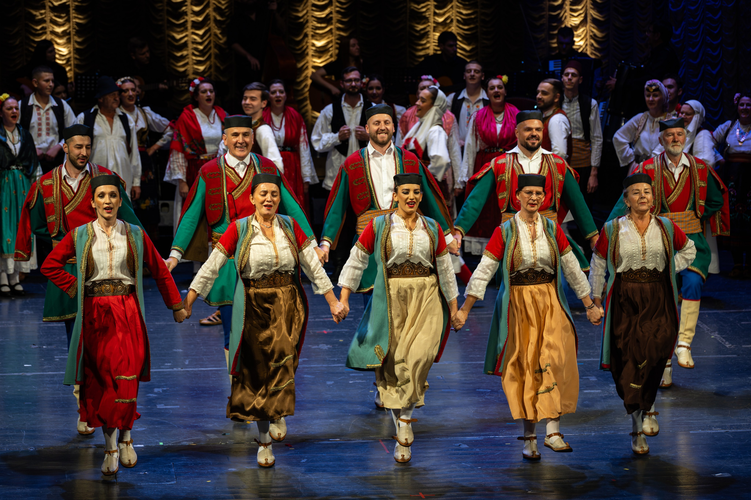 Ceremonial Concert RKUD Proleter is a photography series by photographer Namir Čomaga, documenting a special cultural event celebrating the rich musical and folkloric heritage of Bosnia and Herzegovina. The photographs were created in Sarajevo, capturing moments from the ceremonial concert of RKUD Proleter, including traditional folk dance performances, musicians, orchestral ensembles and the vibrant atmosphere of the stage. Through event and cultural photography, the gallery presents the beauty of traditional costumes, live performances and the cultural identity preserved through music and folklore. This gallery is part of the author’s photography portfolio focusing on Sarajevo photography, event photography, cultural heritage photography and performance photography in Bosnia and Herzegovina.