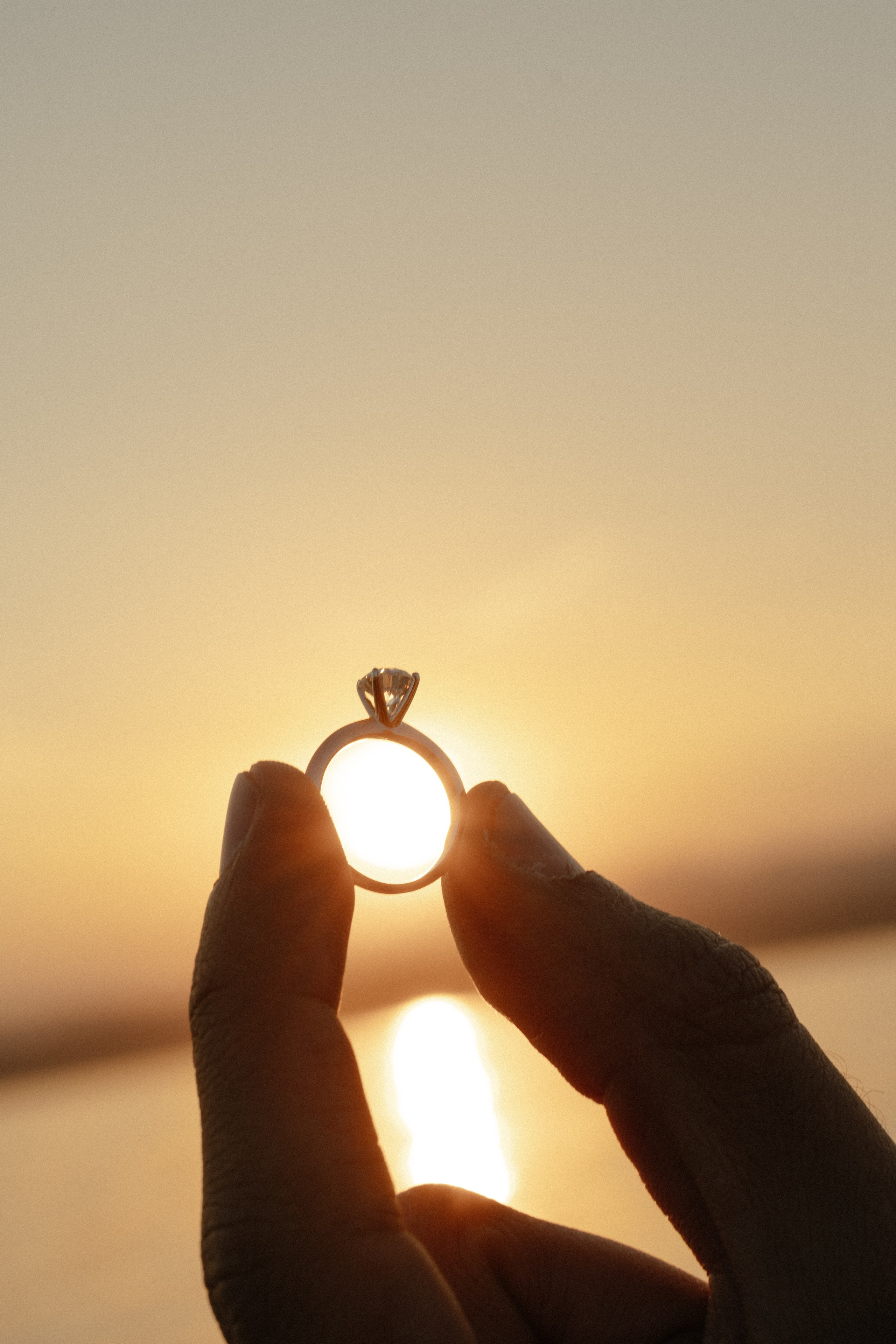 Romantic engagement on Lake Garda during a sunset boat proposal in Sirmione