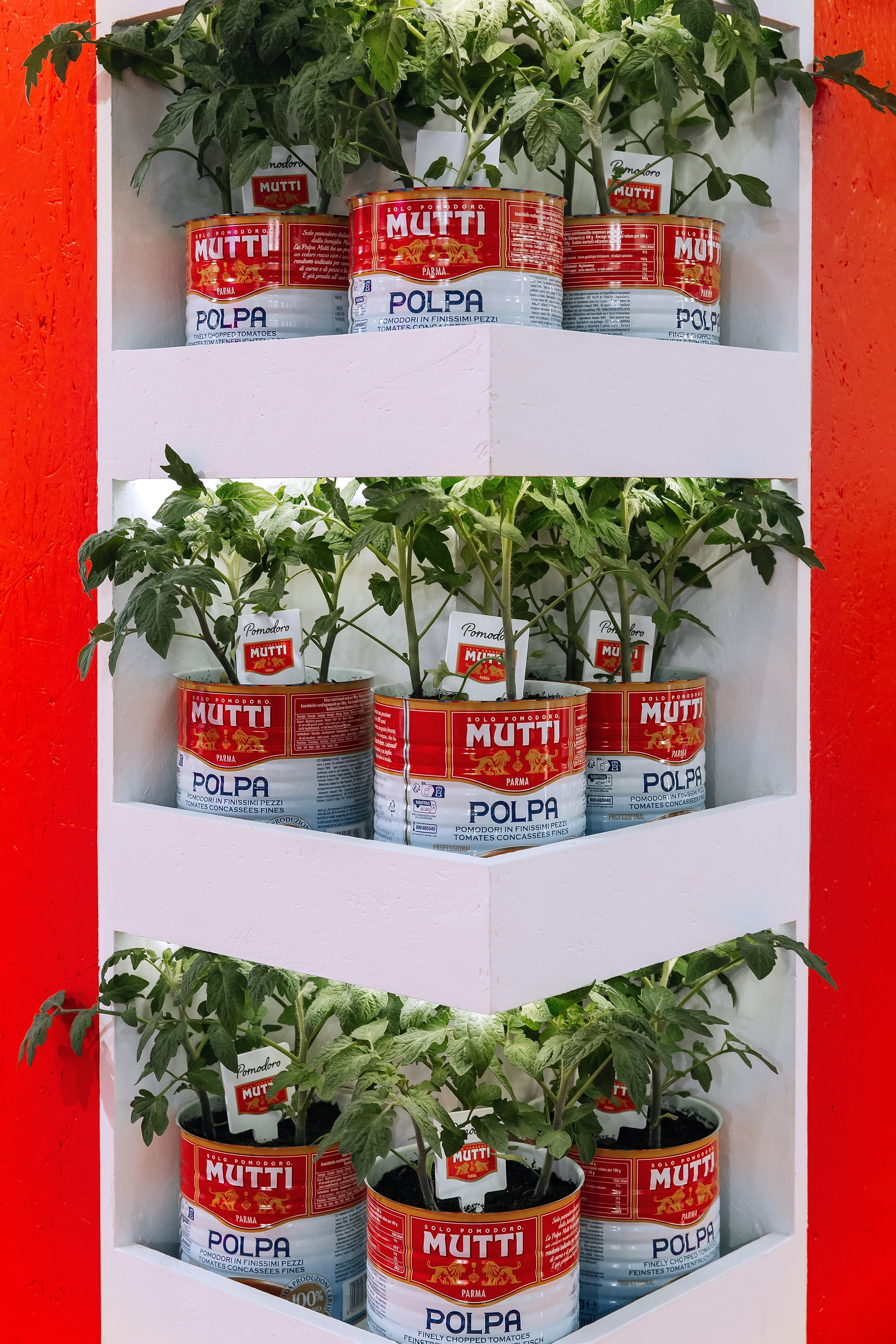 Stand dell'azienda Mutti alla fiera Cibus 2024 a Parma, Area interattiva dell'azienda Mutti alla fiera Cibus 2024