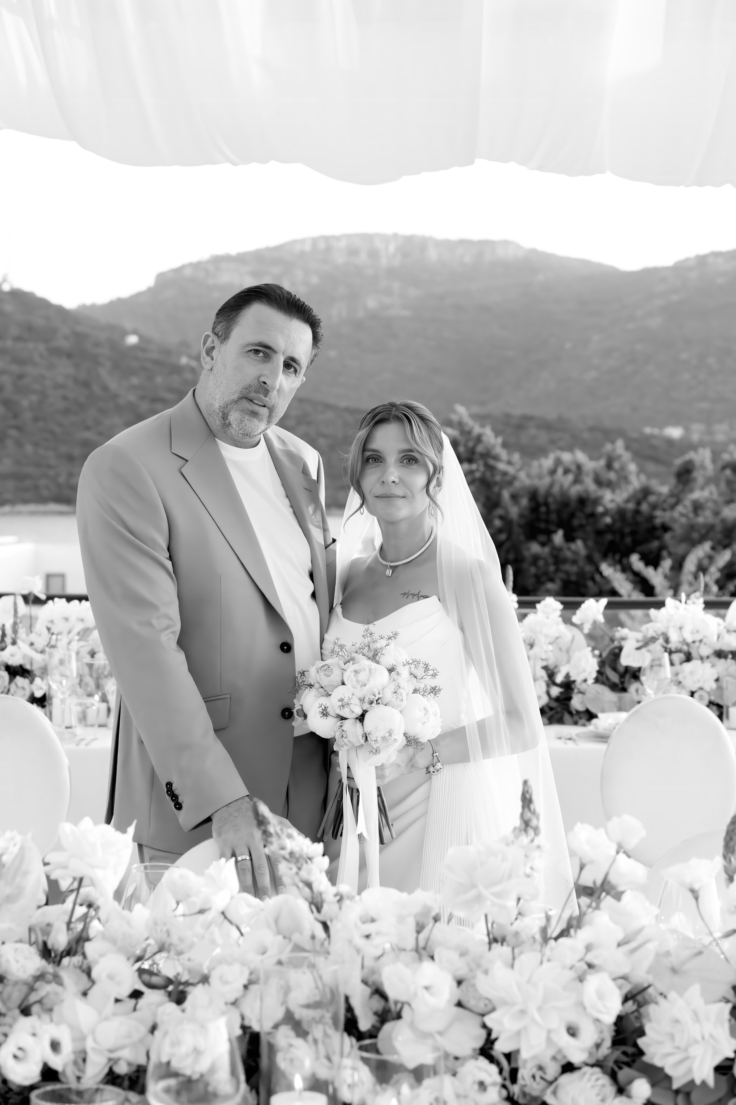 Romantic wedding couple portrait overlooking the Aegean Sea