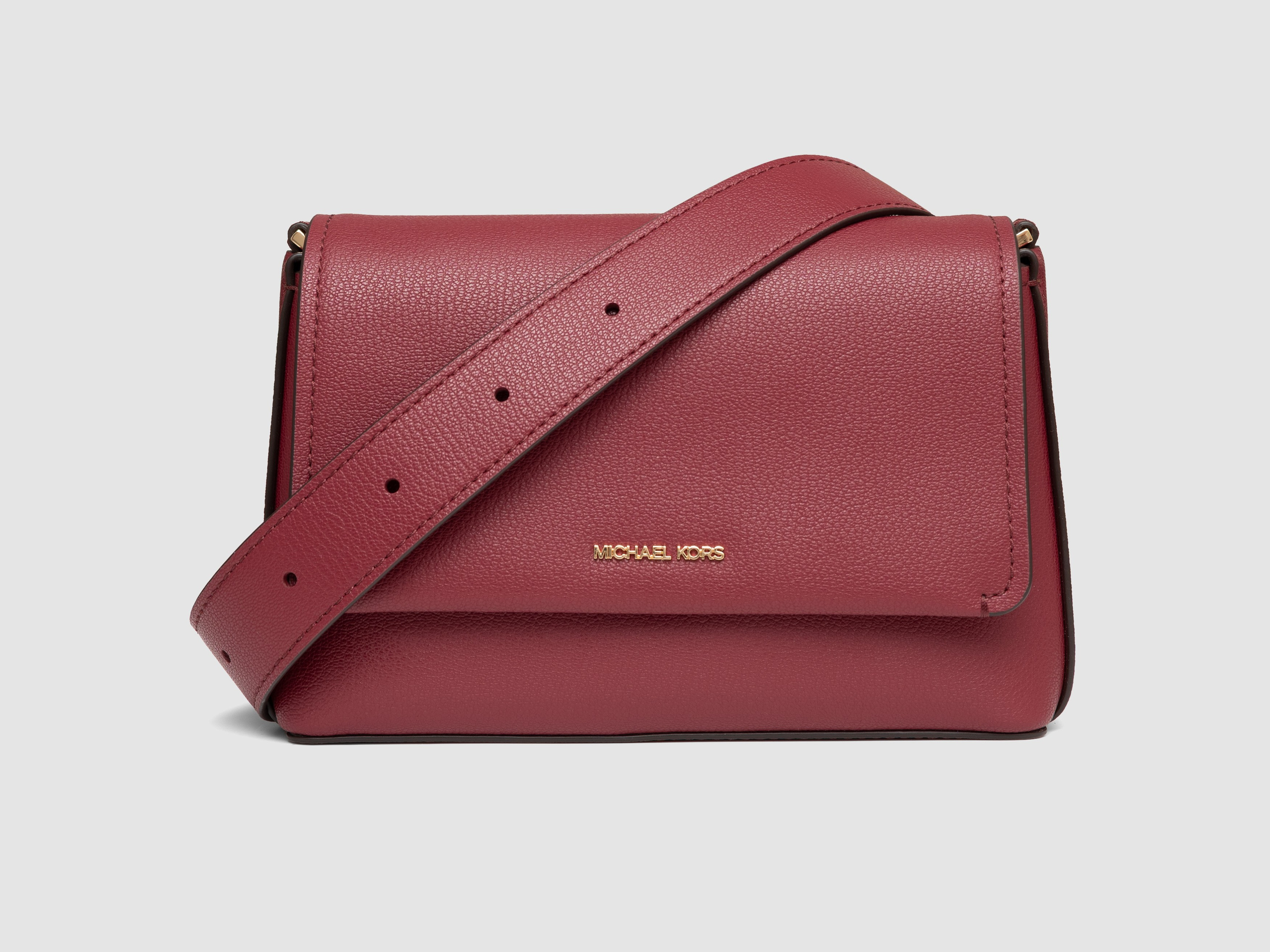 Burgundy crossbody bag side view white background accessories product photography