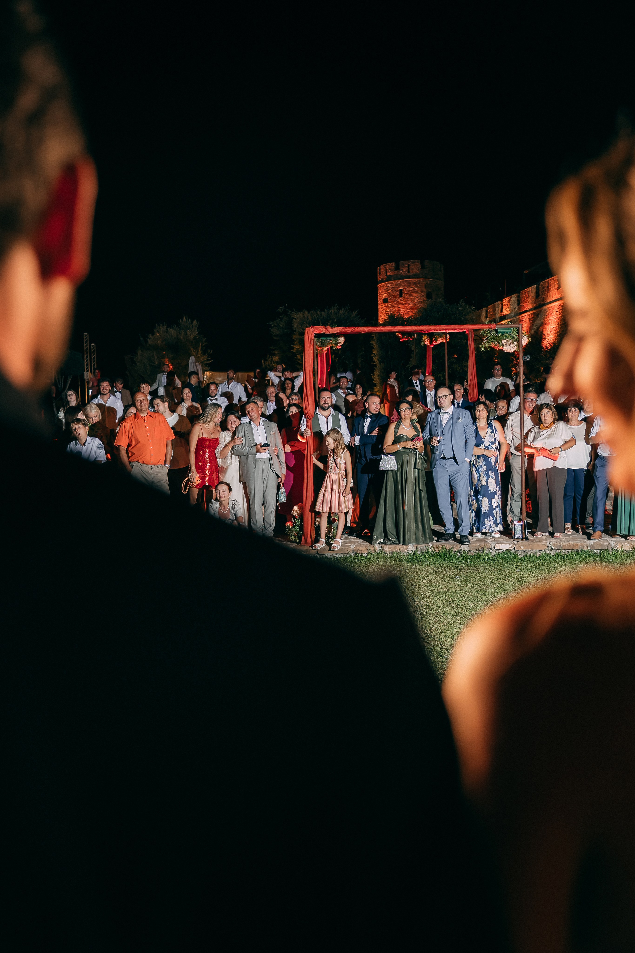 Guests gathered for the final moments of the wedding night at the castle