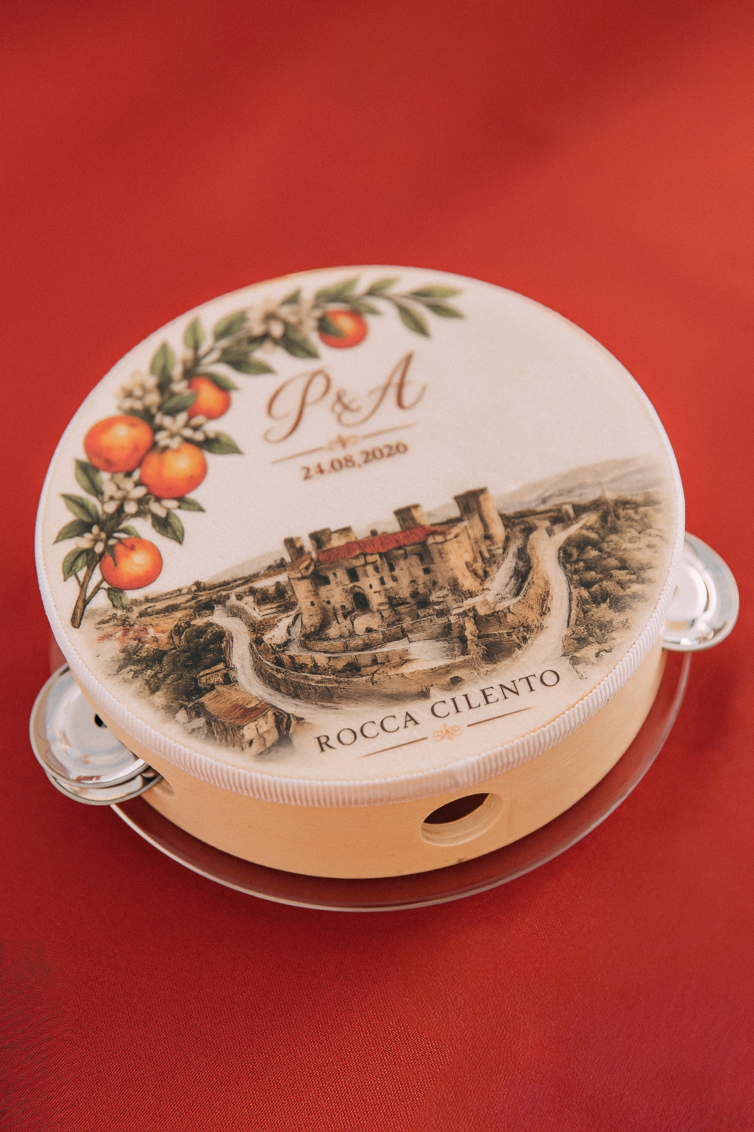 Ceramic wedding favour with the couple's monogram and Rocca Cilento