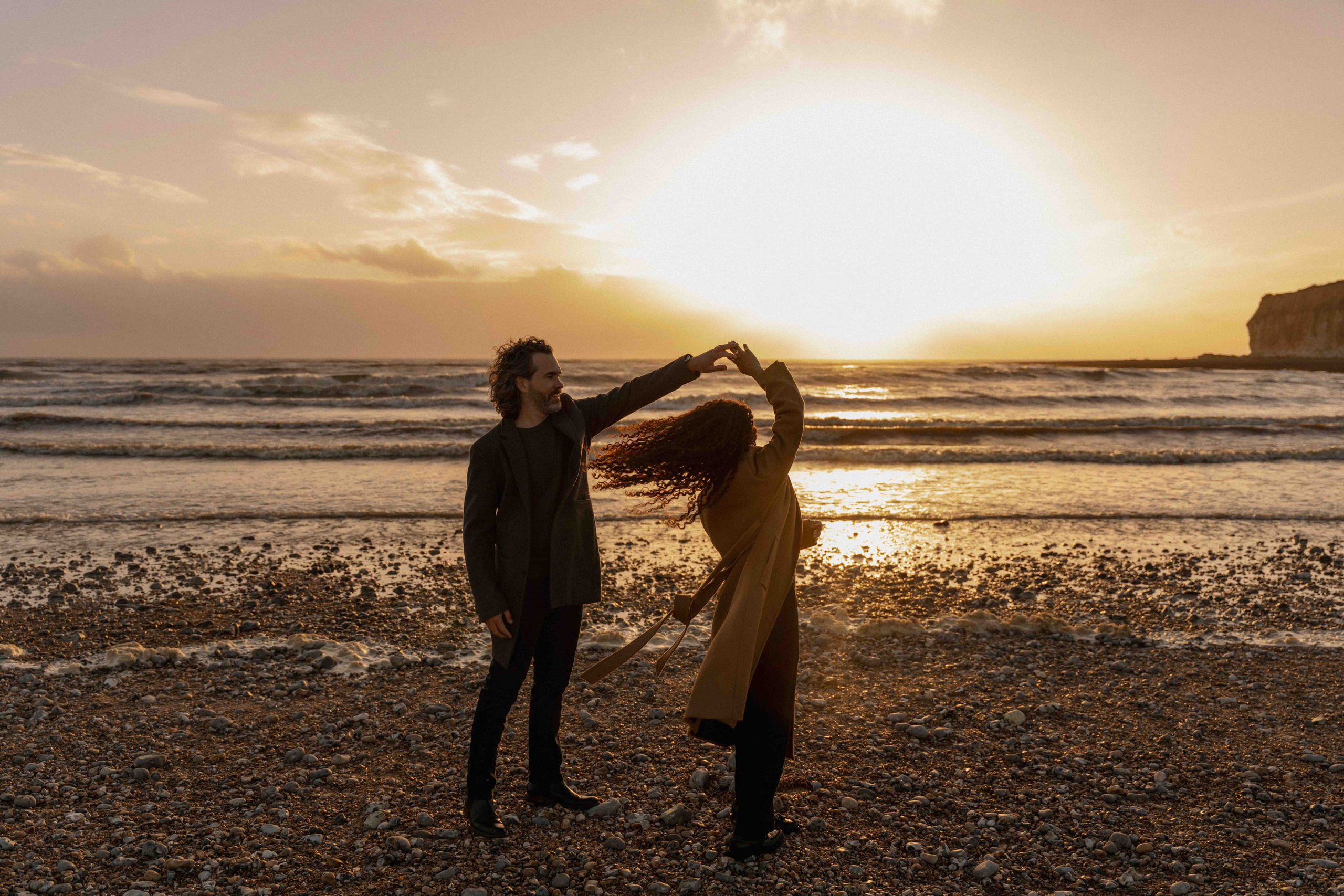 sunset engagement photos seven sisters beach uk golden light